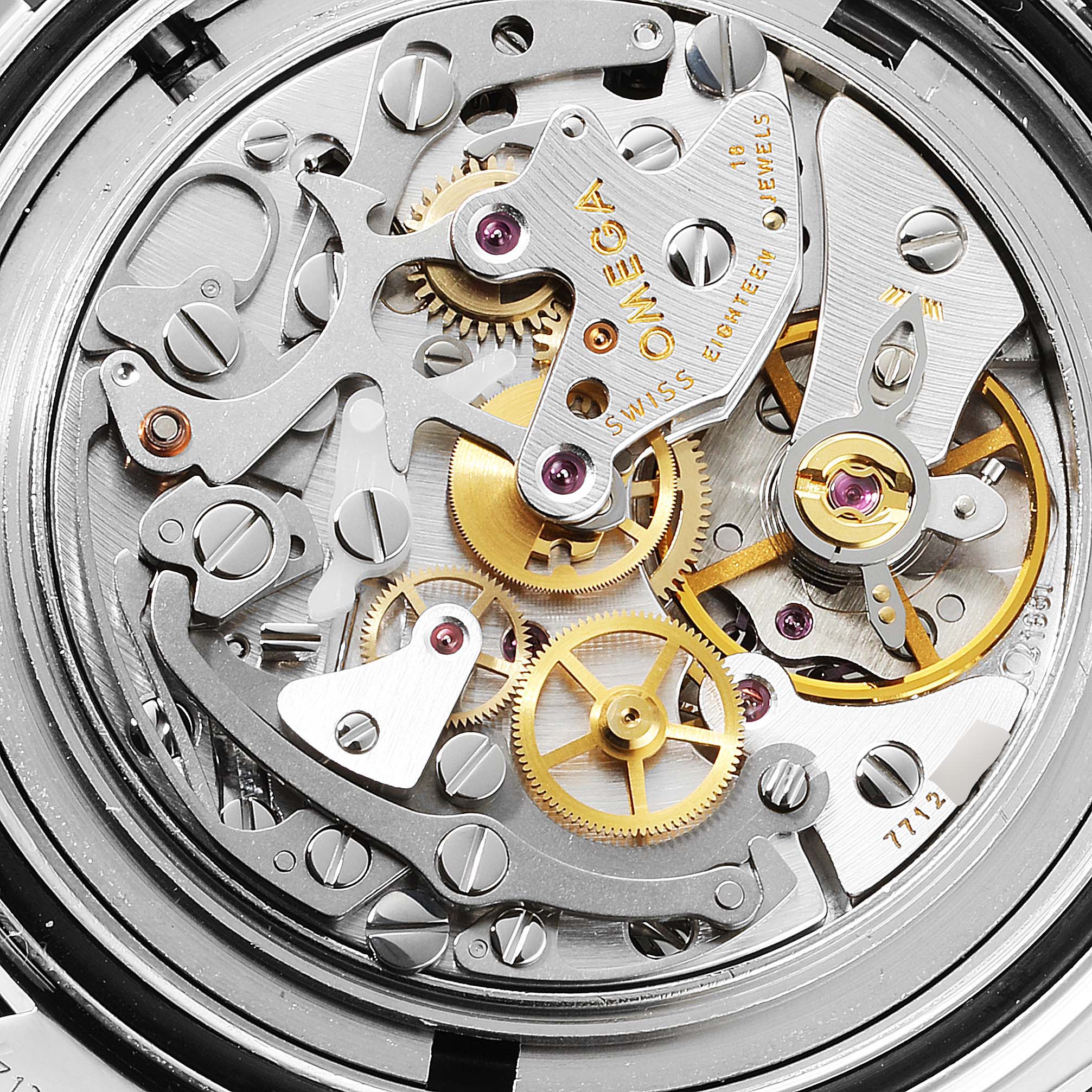 This image shows a close-up of the exposed movement and intricate inner mechanisms of the Omega Speedmaster 3570.50.00 Men
s Stainless Steel Black Dial 3570.50.00 Men
s Stainless Steel Black Dial watch.