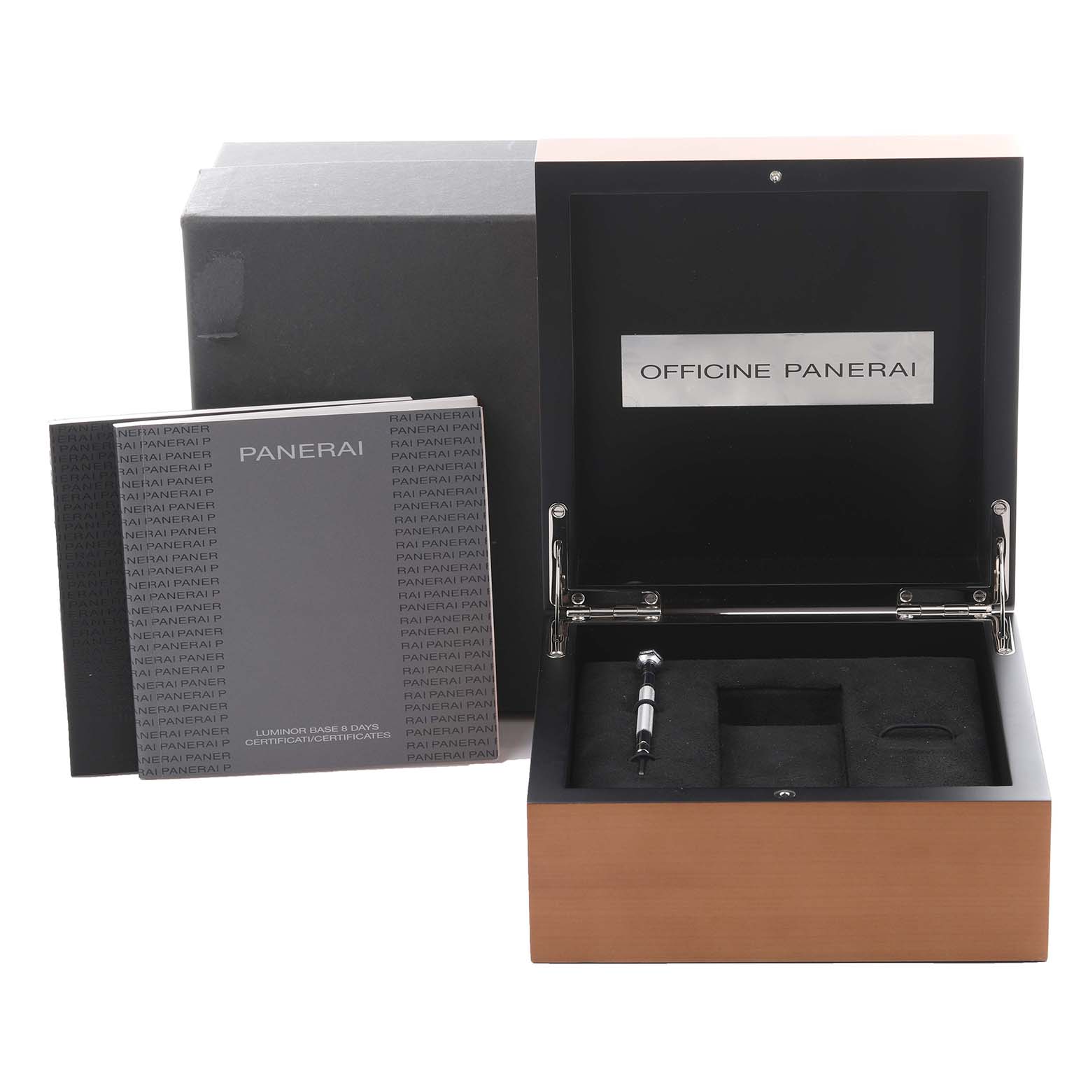 The image shows an open Panerai Luminor PAM00560 Men's Stainless Steel Black Dial PAM00560 Men's Stainless Steel Black Dial watch box at an angle, with a booklet and tool inside.