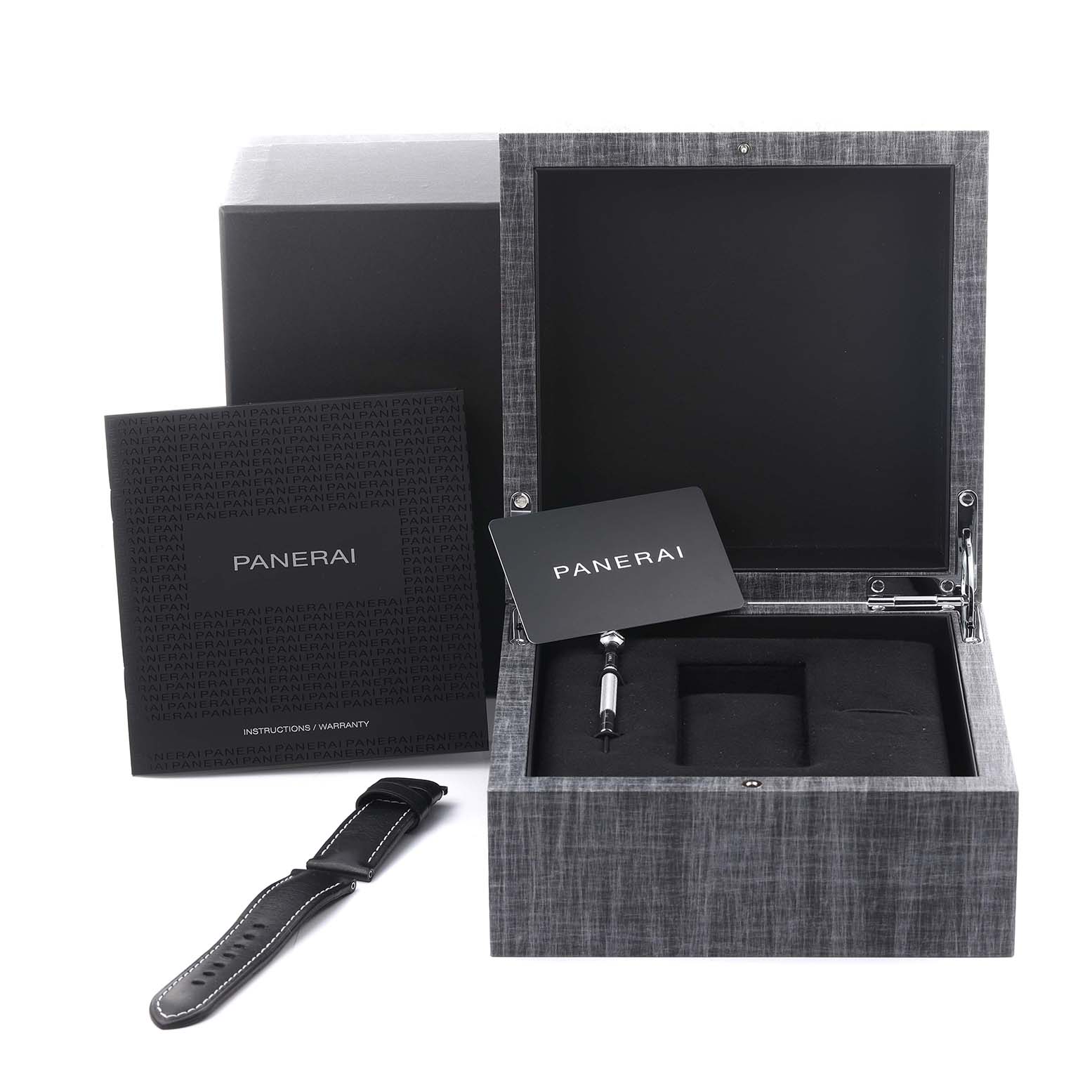 The image shows a Panerai Luminor PAM01037 Men's Ceramic Grey Dial PAM01037 Men's Ceramic Grey Dial watch box, strap, tool, warranty card, and instructions from a top angle.