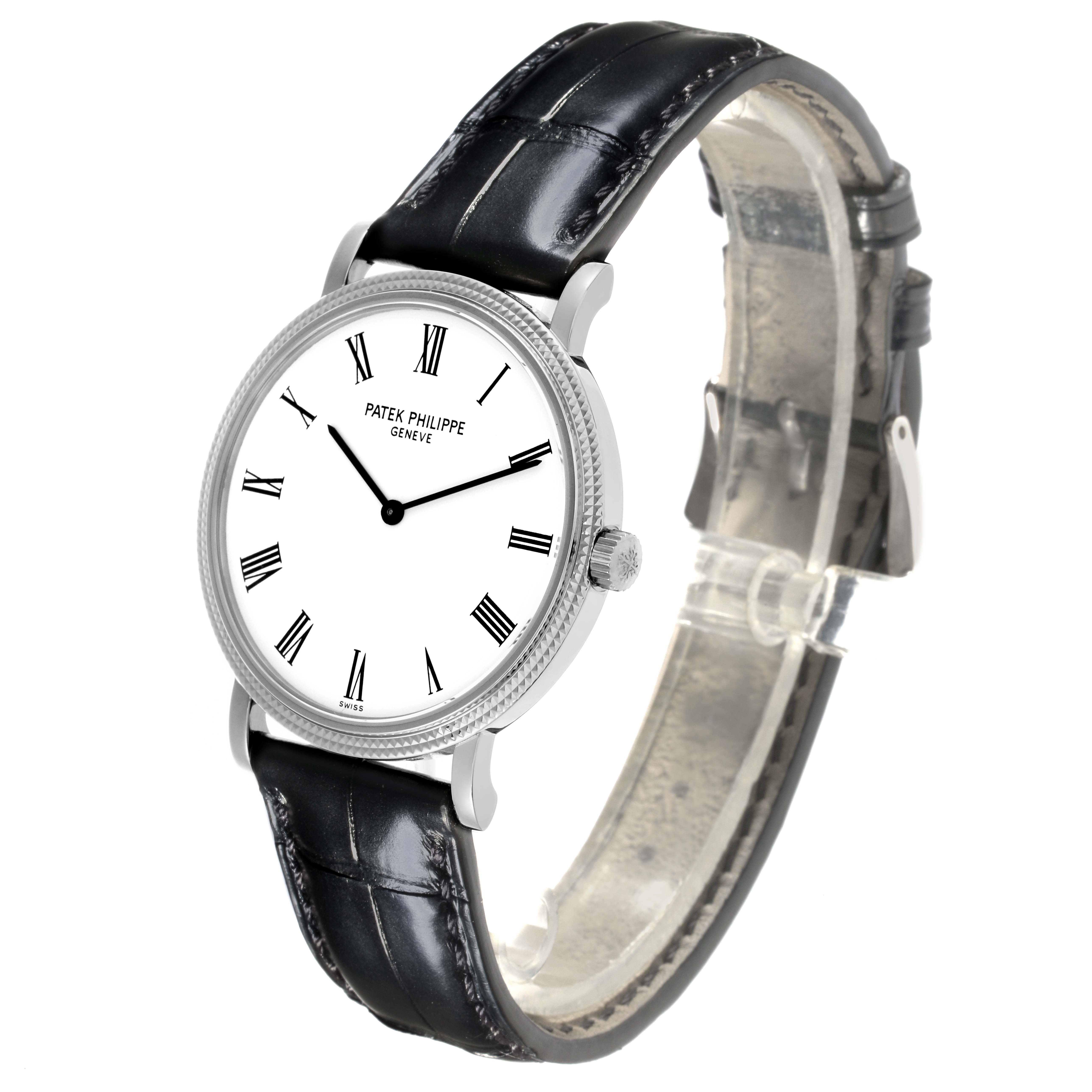 The Patek Philippe Calatrava 5120G Men's White Gold White Dial 5120G Men's White Gold White Dial watch is shown at a slight angle displaying its face, bezel, crown, and black leather strap.