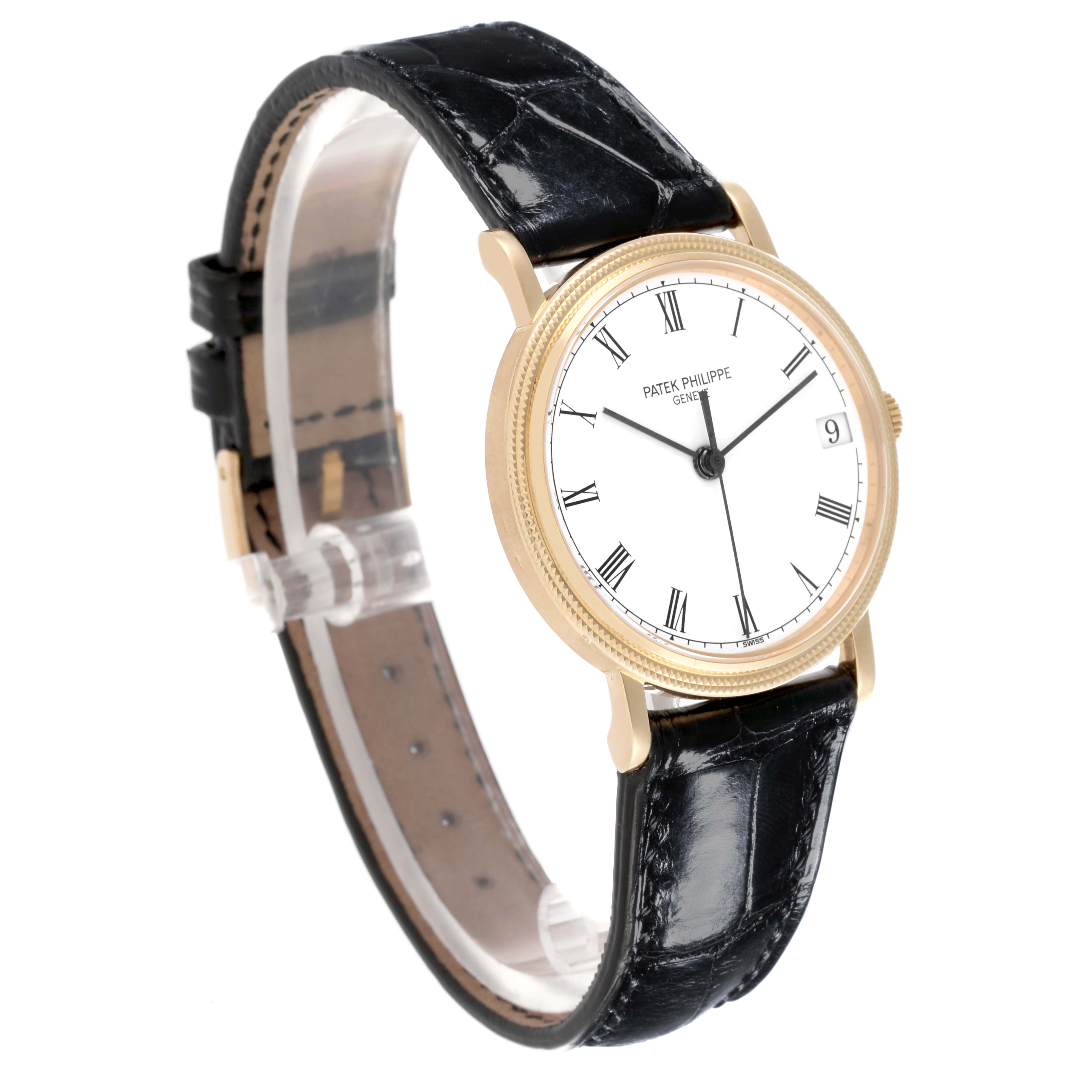 The Patek Philippe Calatrava 3802/200 Men's Yellow Gold White Dial 3802/200 Men's Yellow Gold White Dial watch is shown at a slight angle, highlighting the dial, case, and leather strap.