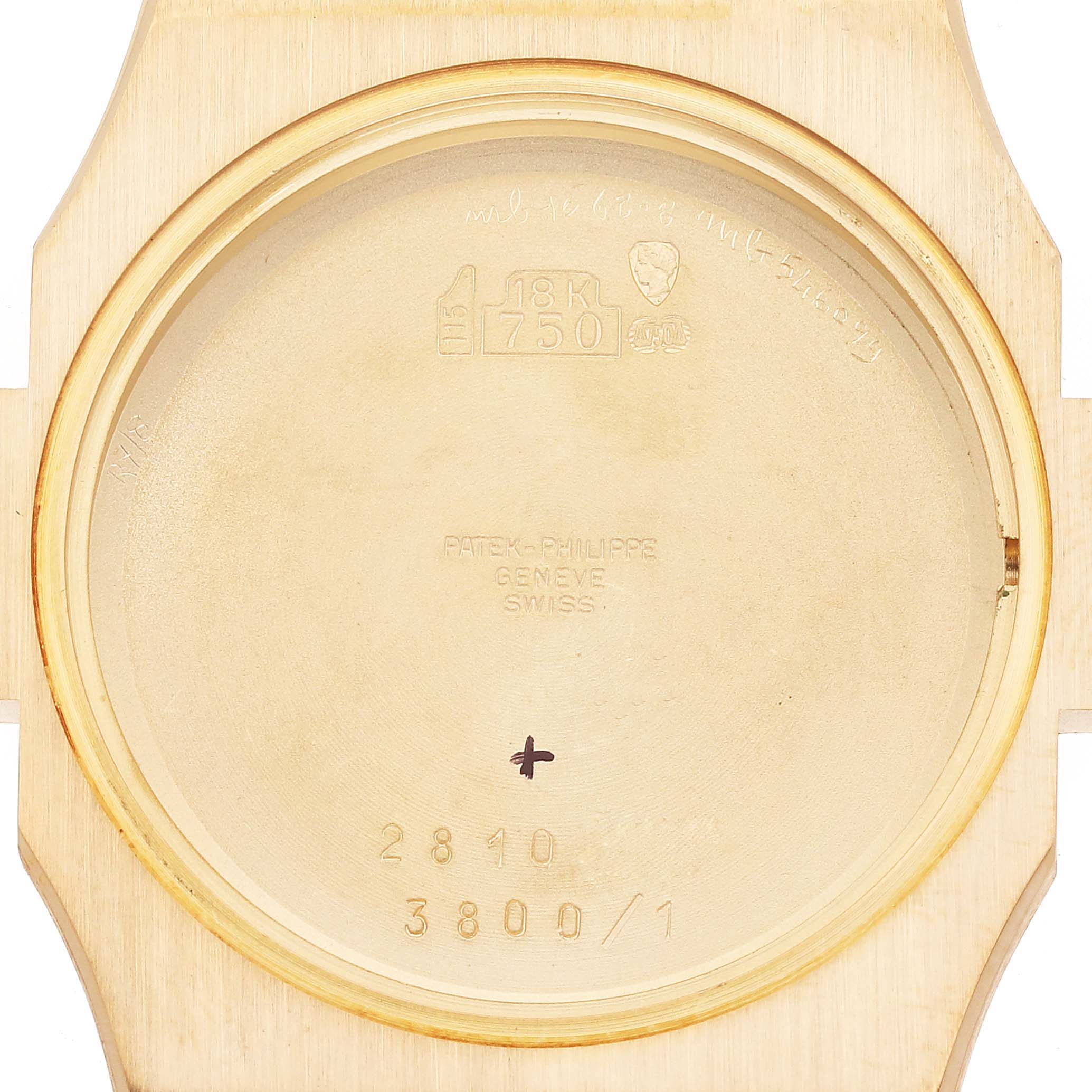 This is the back cover of a Patek Philippe Nautilus 3800/1J Men's Yellow Gold Champagne Dial 3800/1J Men's Yellow Gold Champagne Dial 3800/1, showing the internal engravings and gold content markings.