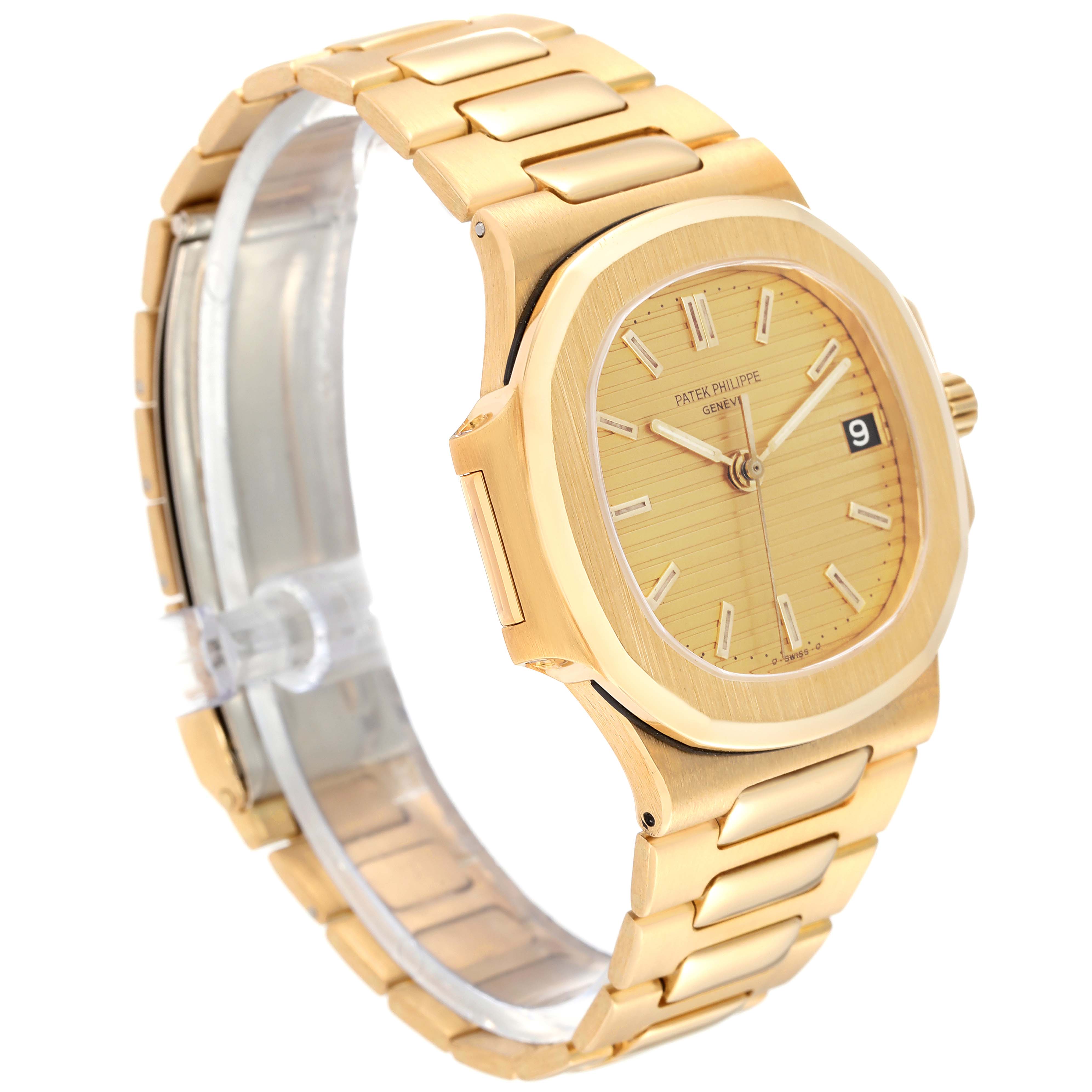 The image shows a Patek Philippe Nautilus 3800/1J Men's Yellow Gold Champagne Dial 3800/1J Men's Yellow Gold Champagne Dial watch at a 3/4 angle, highlighting its gold case, dial, and bracelet.