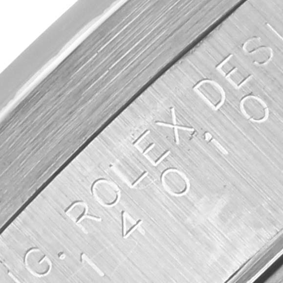 The image shows a close-up of the edge with engraved details of the Rolex Air-King 14010 Men's Stainless Steel Pink Dial 14010 Men's Stainless Steel Pink Dial watch.