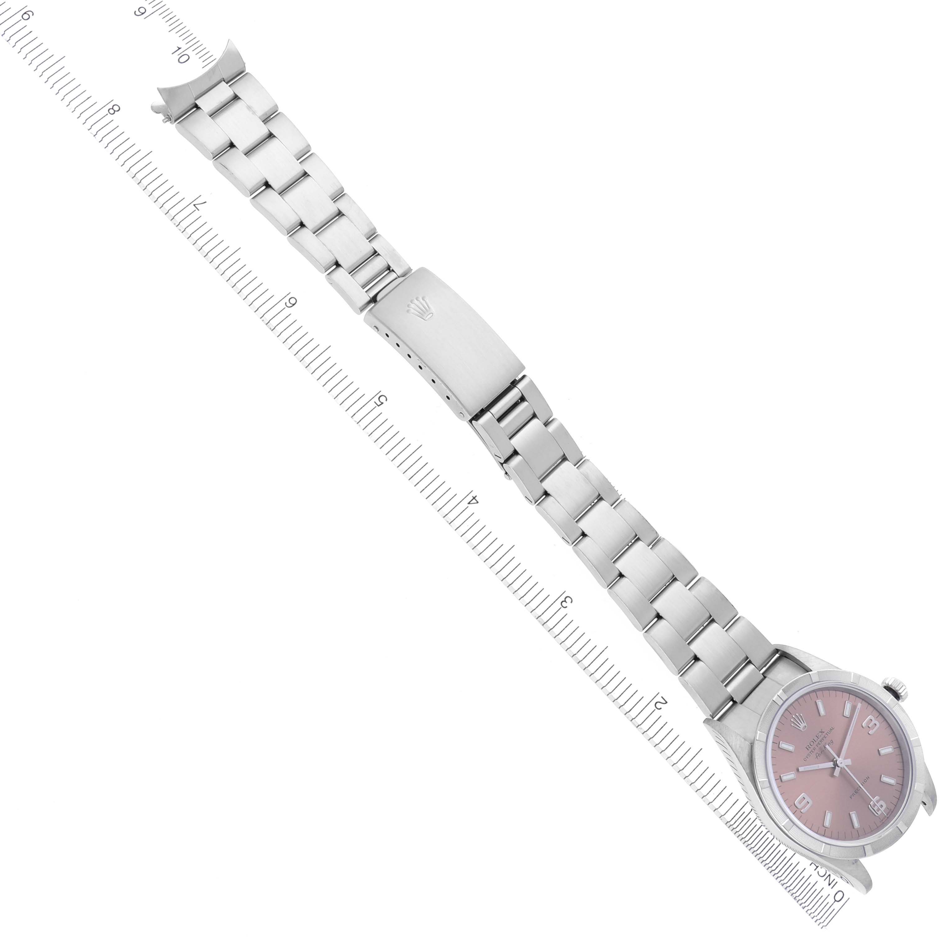 The Rolex Air-King 14010 Men's Stainless Steel Pink Dial 14010 Men's Stainless Steel Pink Dial watch is shown from an overhead angle, displaying the bracelet and dial.
