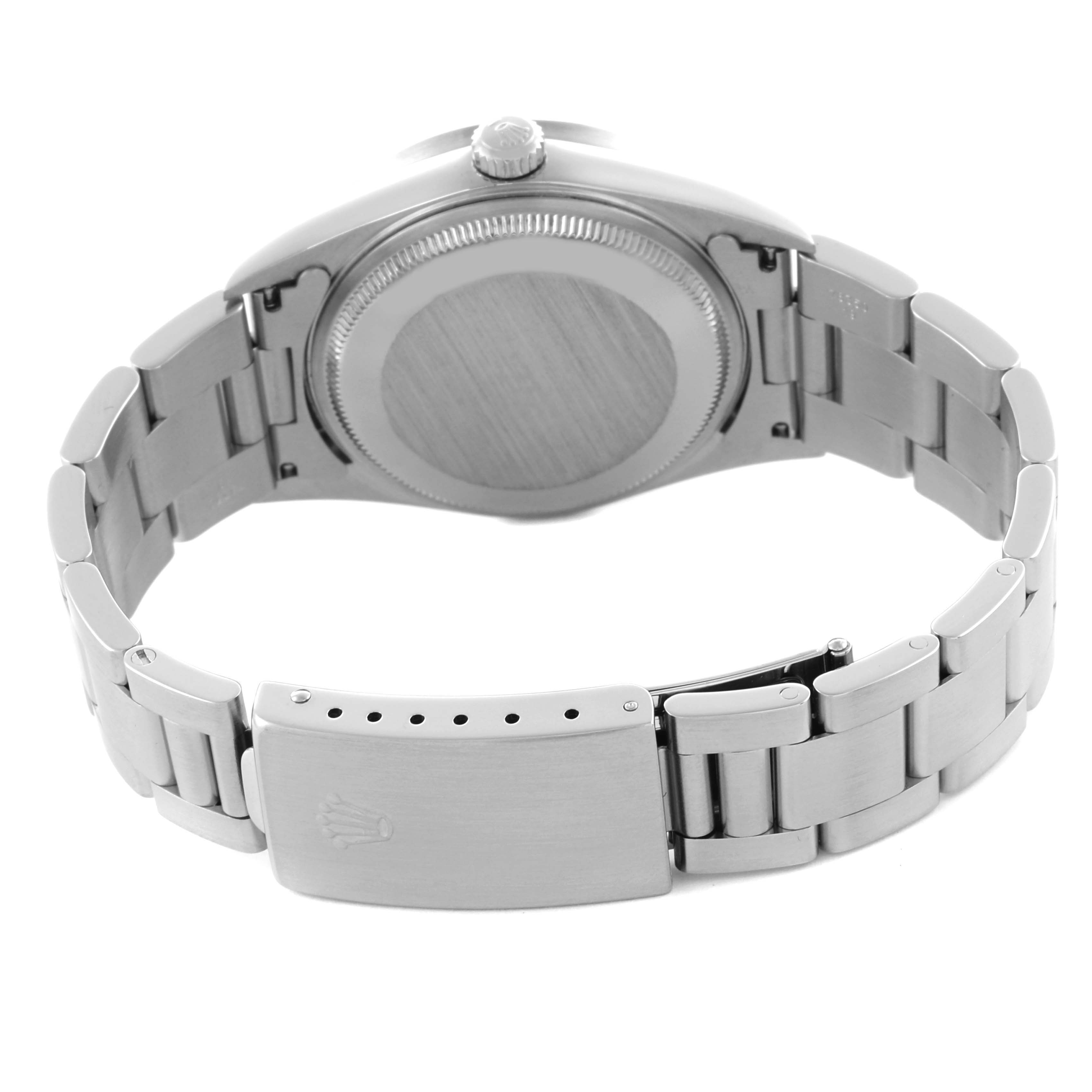 The Rolex Air-King 14010 Men's Stainless Steel Pink Dial 14010 Men's Stainless Steel Pink Dial watch is shown from the back, highlighting the case back, bracelet, and clasp.