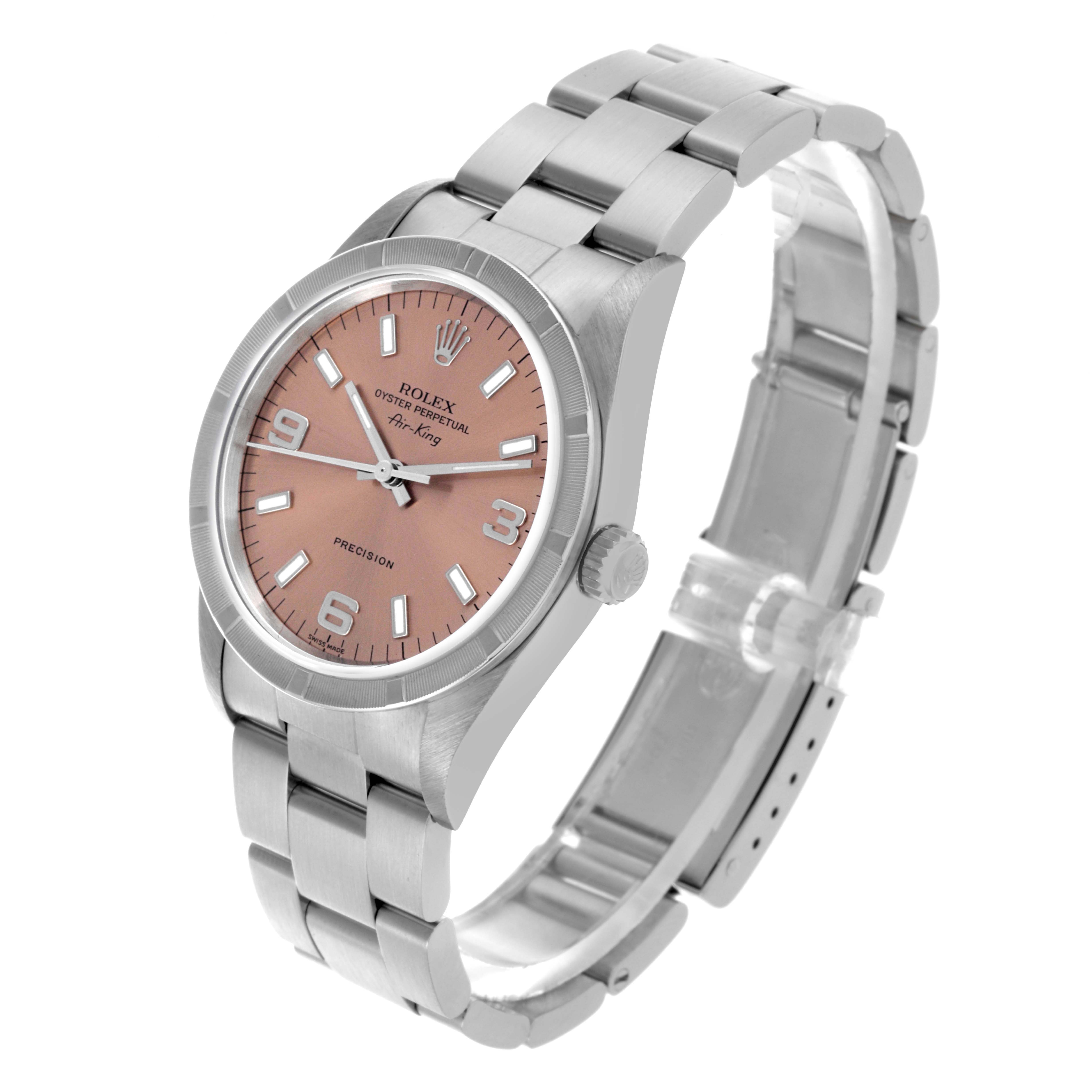 The Rolex Air-King 14010 Men's Stainless Steel Pink Dial 14010 Men's Stainless Steel Pink Dial watch is shown at a three-quarter angle, displaying the face, bezel, crown, and bracelet.