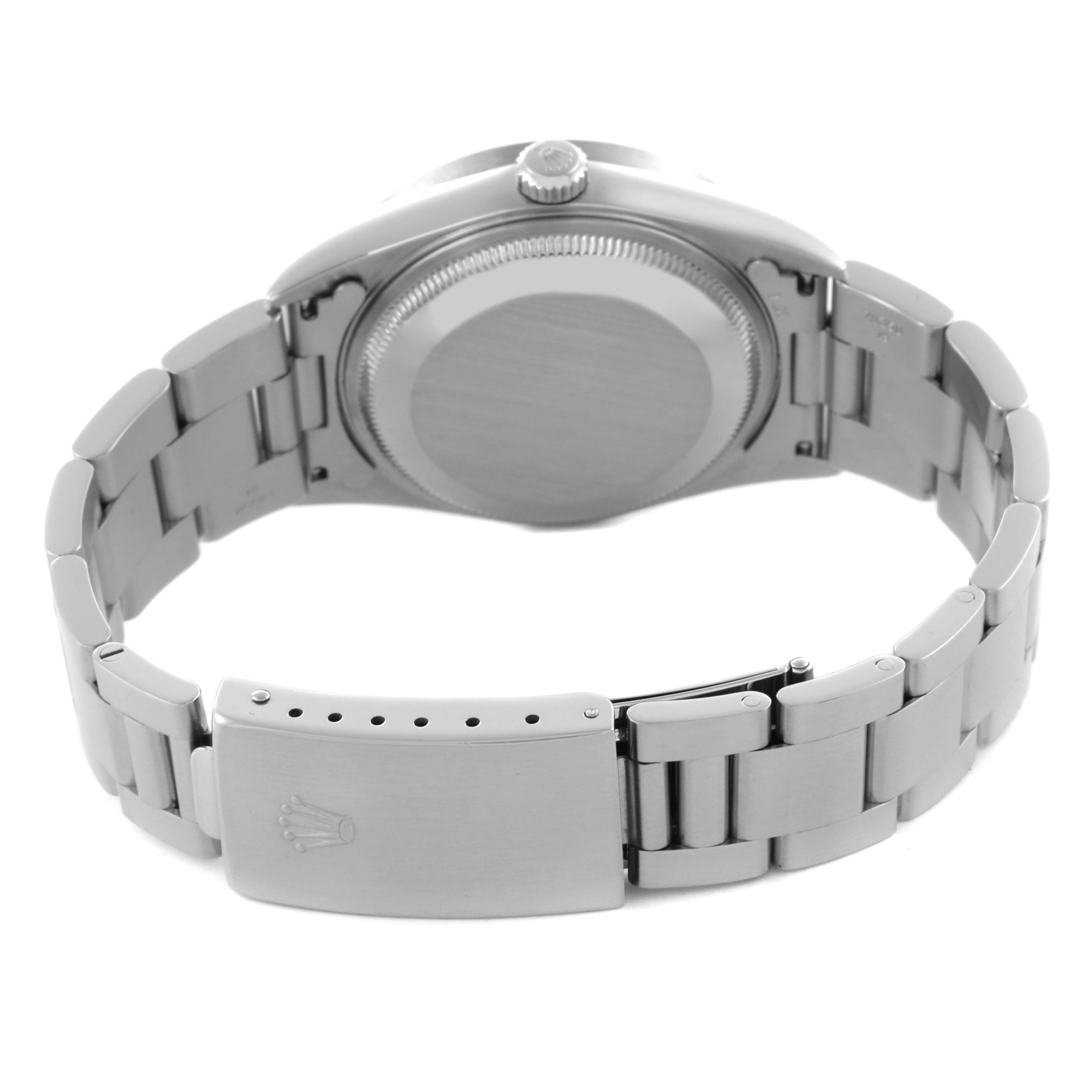 The Rolex Date 15210 Men's Stainless Steel White Dial 15210 Men's Stainless Steel White Dial watch is shown from the back, displaying the case back and a partially clasped metal bracelet.