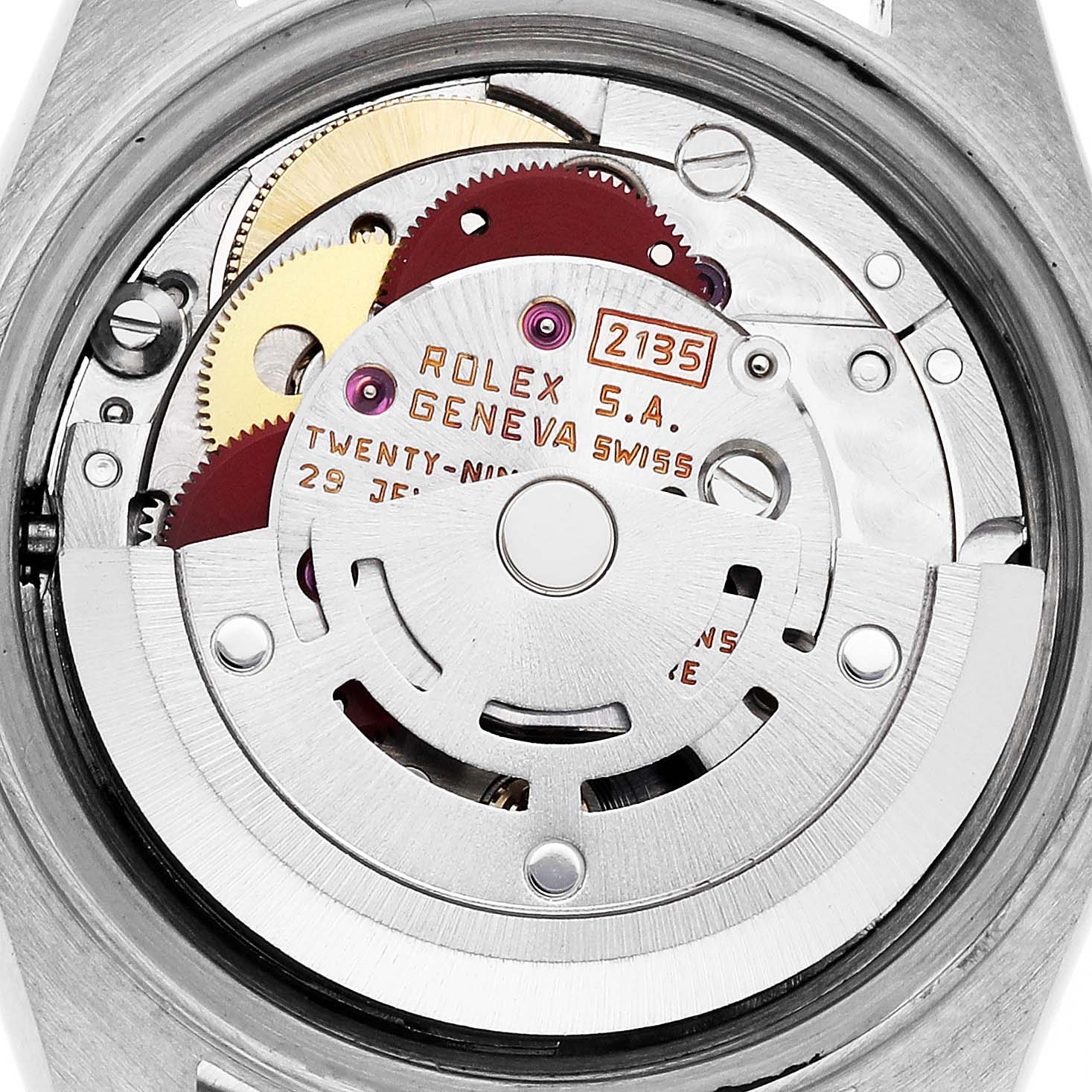 The image shows the intricate inner mechanics of a Rolex Date 69173 Women
s Steel and Gold (two tone) White Dial 69173 Women
s Steel and Gold (two tone) White Dial model, focusing on the movement components.