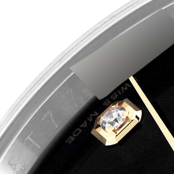 The image shows a close-up of the Datejust model by Rolex, highlighting the bezel and a jeweled hour marker.