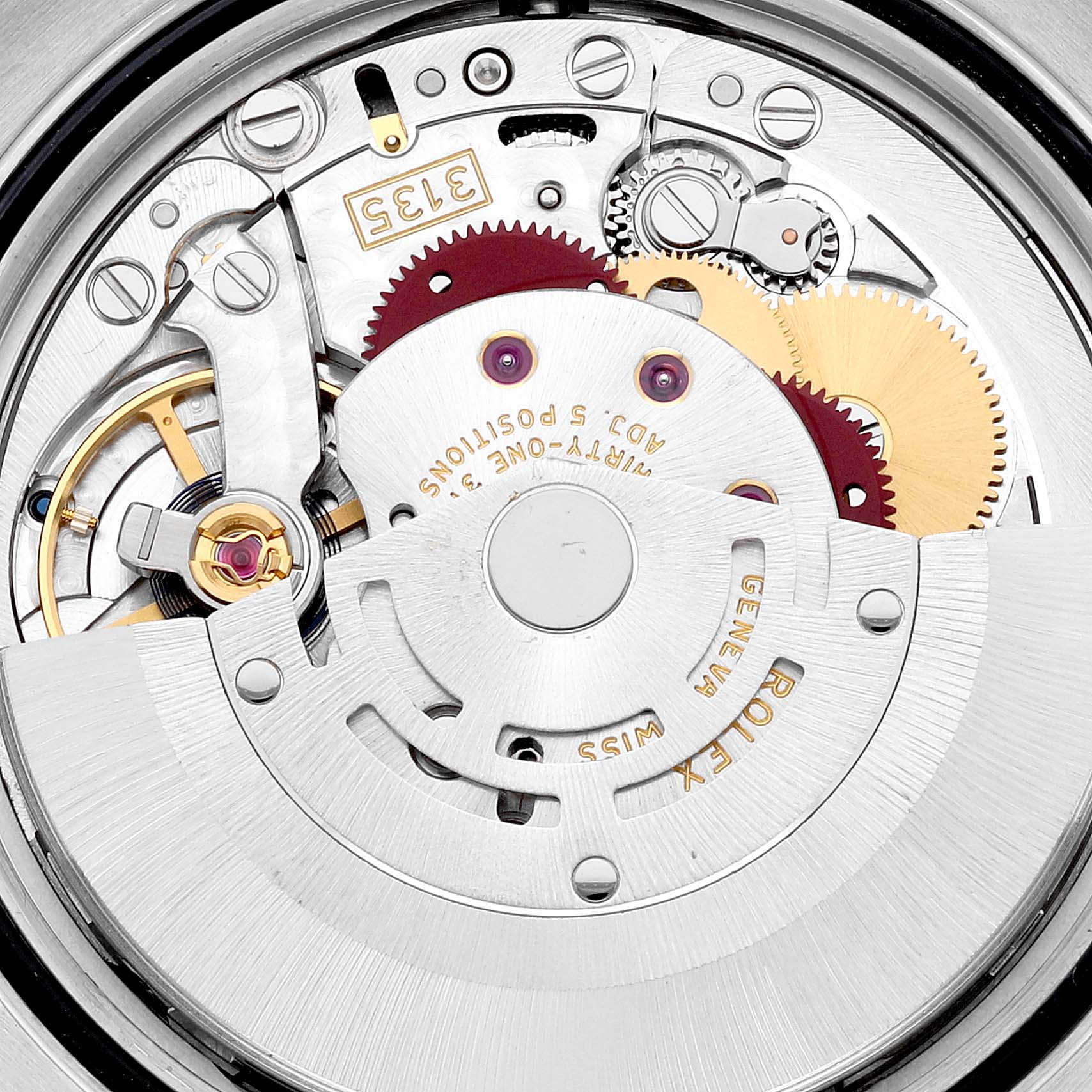 The image shows a close-up view of the movement mechanism of a Rolex Datejust 116243 Men's Steel and Gold (two tone) Black Dial 116243 Men's Steel and Gold (two tone) Black Dial watch, highlighting gears and intricate components.