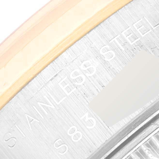 The image shows a close-up of the metal casing and engraving on the Rolex Datejust 69173 Women's Steel and Gold (two tone) Blue Dial 69173 Women's Steel and Gold (two tone) Blue Dial watch.
