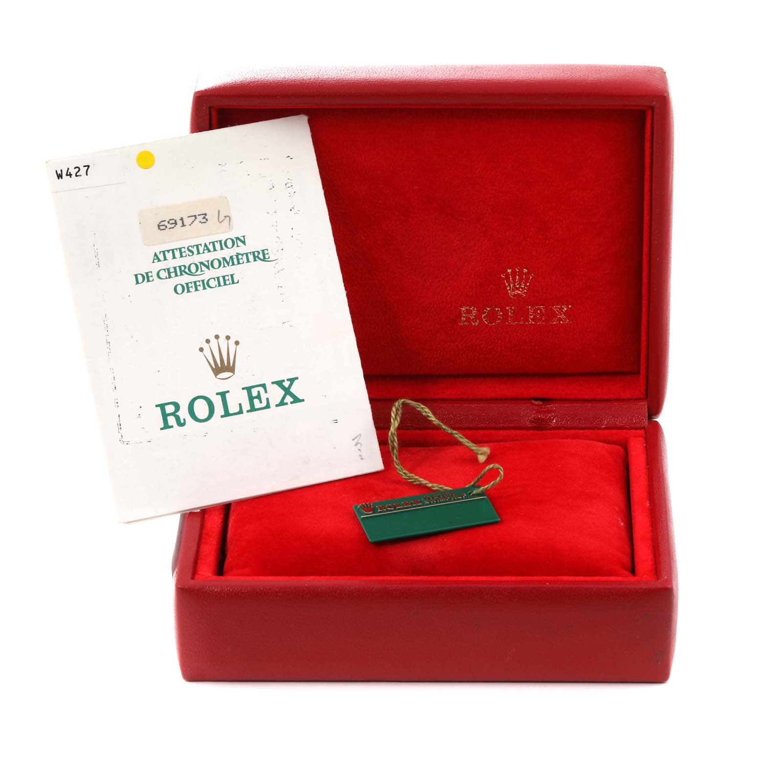 The image shows a red Rolex Datejust 69173G Women's Steel and Gold (two tone) Champagne Dial 69173G Women's Steel and Gold (two tone) Champagne Dial watch box, with documentation and a green tag inside.