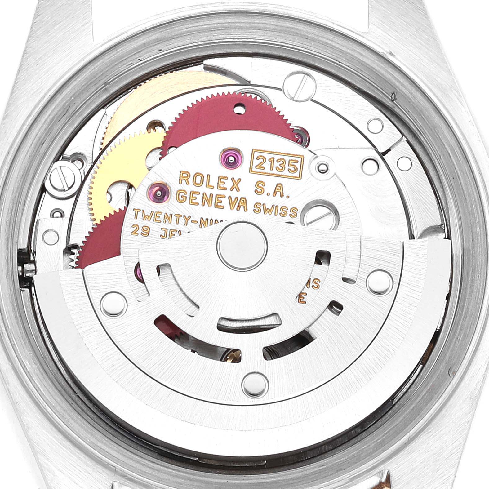 The image shows a close-up of the movement mechanism inside a Rolex Datejust 69173G Women's Steel and Gold (two tone) Champagne Dial 69173G Women's Steel and Gold (two tone) Champagne Dial watch, highlighting gears and intricate details.