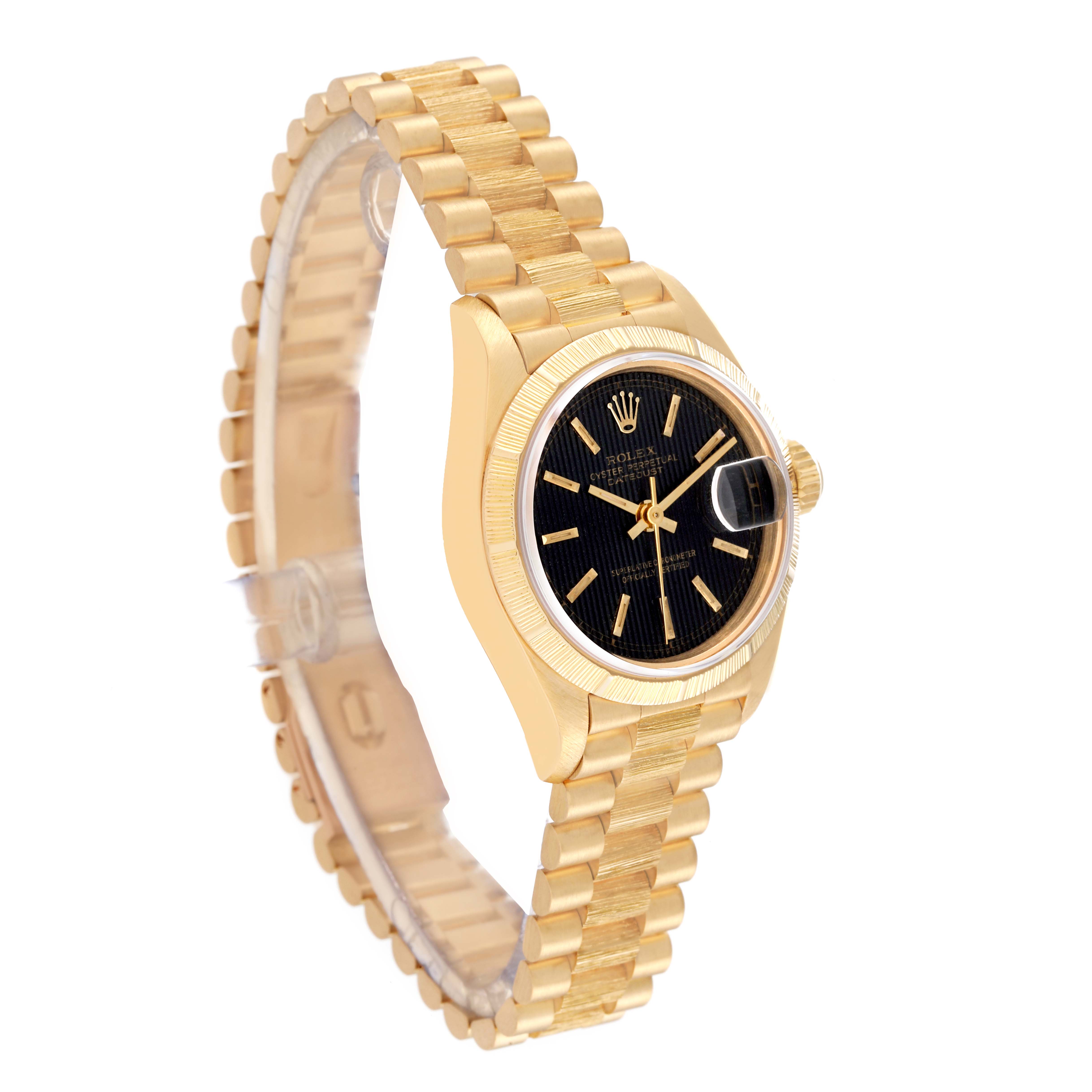 This image shows a Rolex Datejust 69278 Women's Yellow Gold Black Dial 69278 Women's Yellow Gold Black Dial watch from an angled perspective, highlighting the bracelet, case, and dial.