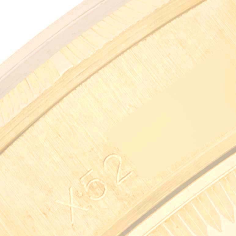This close-up image shows the inner side of the band on a Rolex Datejust 69278 Women's Yellow Gold Black Dial 69278 Women's Yellow Gold Black Dial watch.