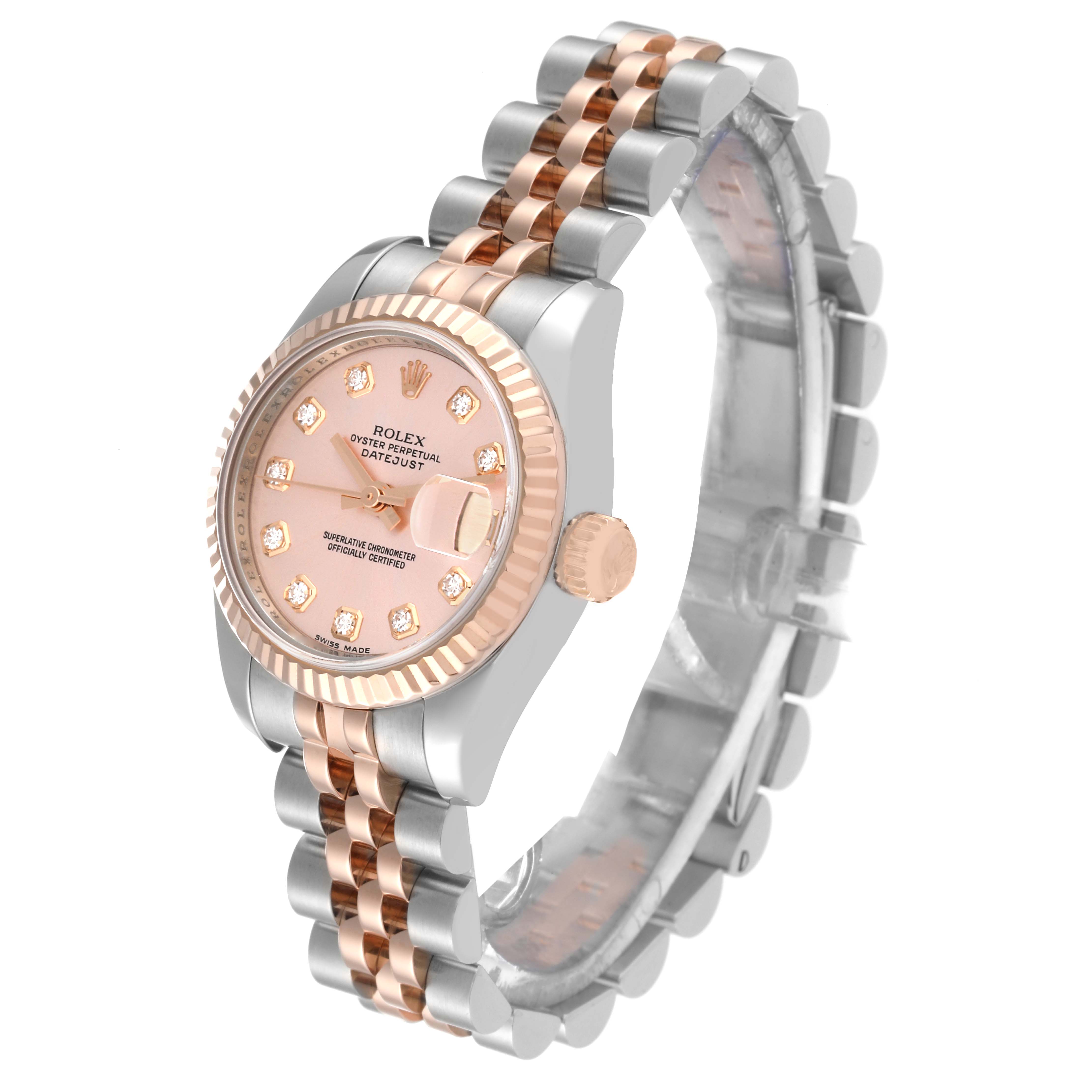 The image shows a Rolex Datejust 179171 Women's Steel and Gold (two tone) Pink Dial 179171 Women's Steel and Gold (two tone) Pink Dial watch at a three-quarter angle, displaying its face, bezel, crown, and two-tone bracelet.