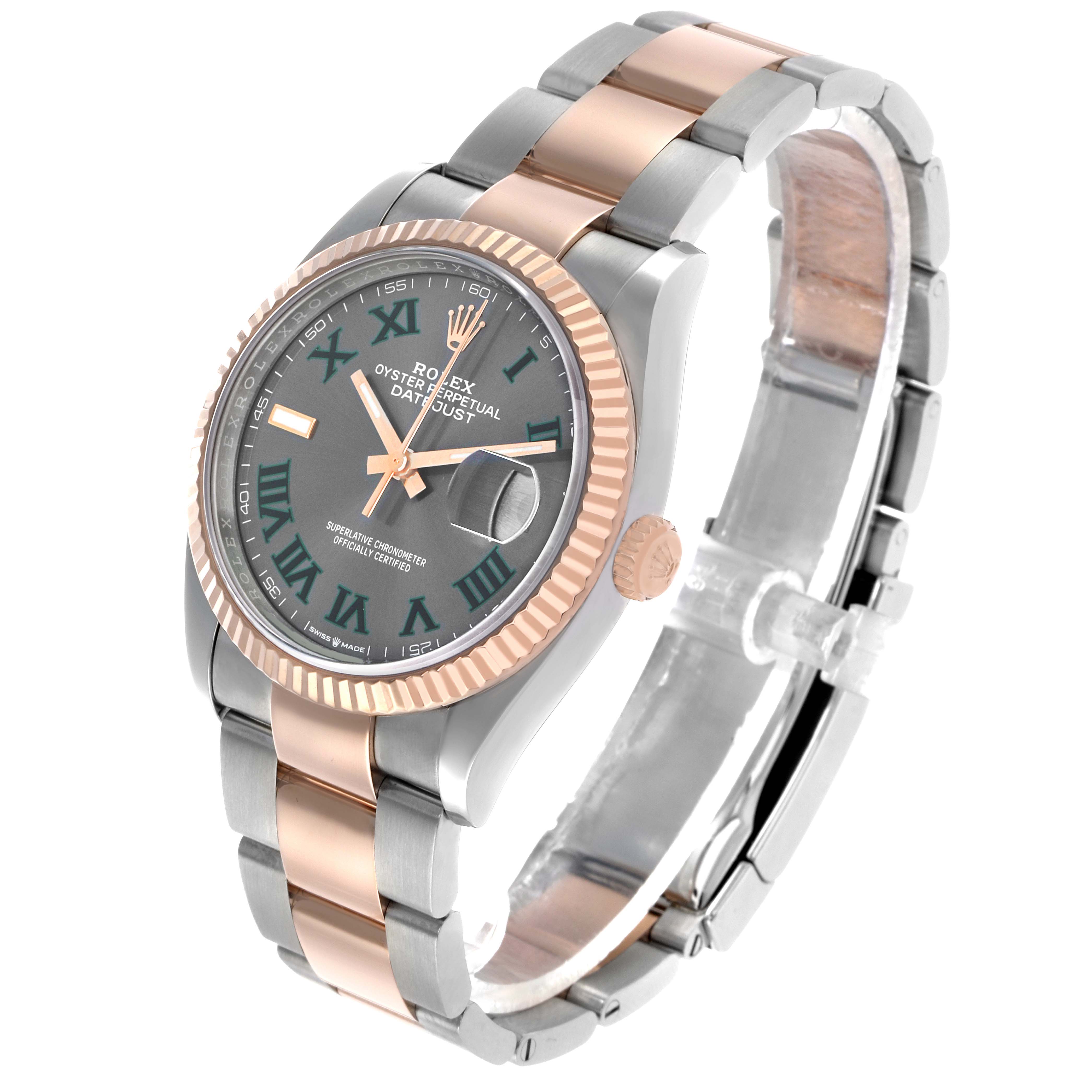 The Rolex Datejust 126231 Men's Steel and Gold (two tone) Grey Dial watch is shown at a three-quarter angle, displaying its two-tone band, fluted bezel, and dial with Roman numerals.