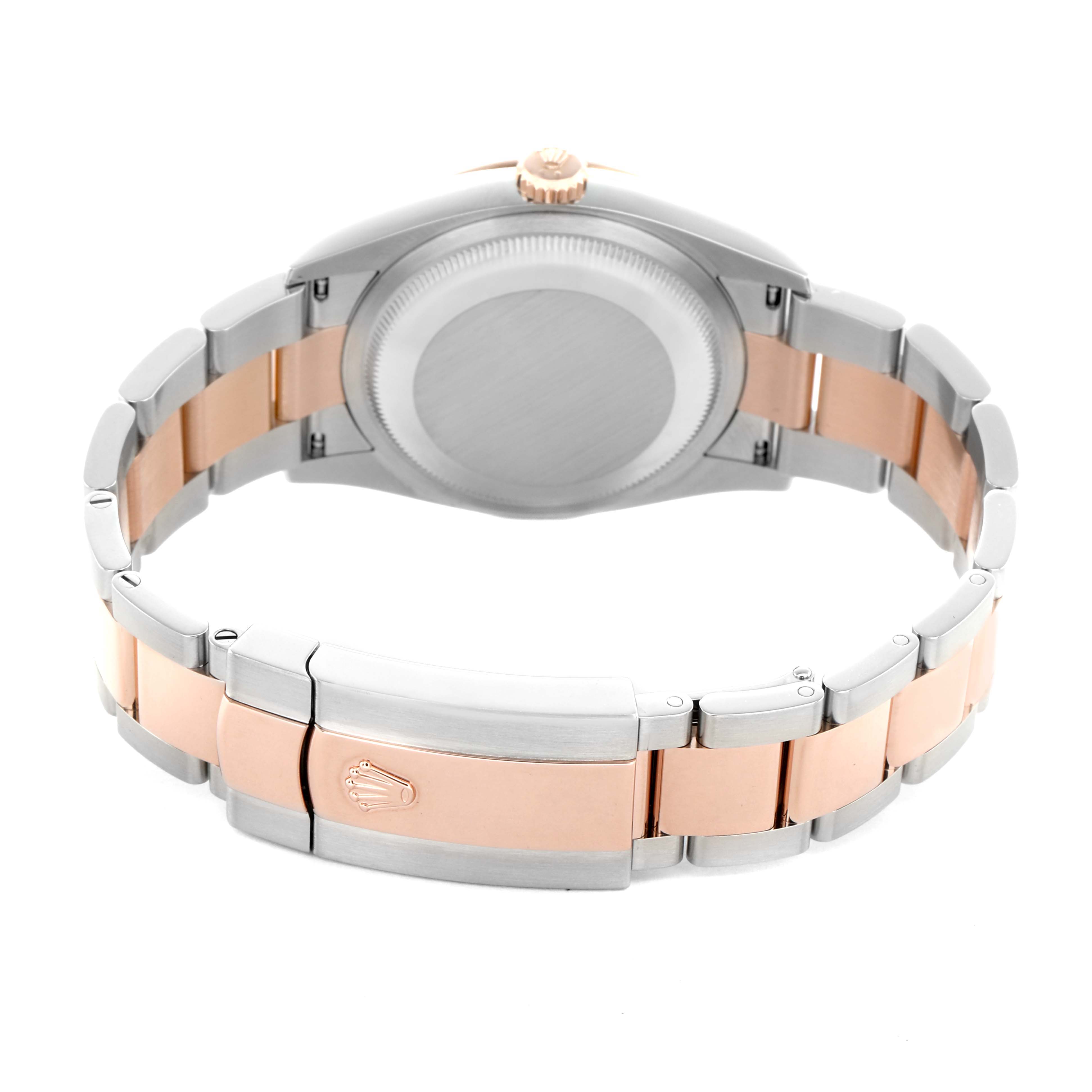 The image shows the back case and clasp of a Rolex Datejust 126231 Men's Steel and Gold (two tone) Grey Dial watch, highlighting the two-tone bracelet.