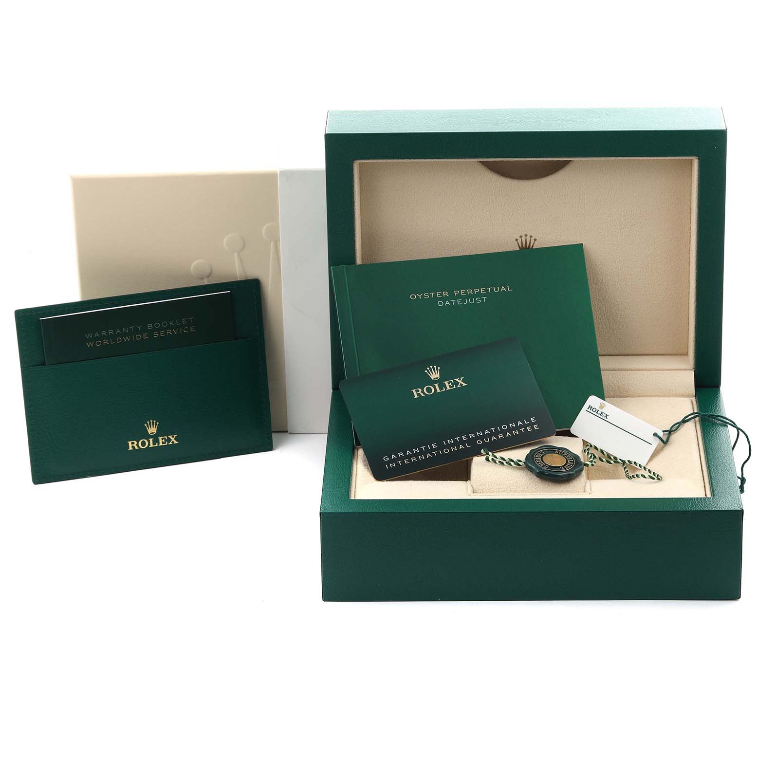 The image shows accessories for the Rolex Datejust 126234 Men's Stainless Steel Grey Dial 126234 Men's Stainless Steel Grey Dial, including the box, warranty booklet, and tags, from a top angle.