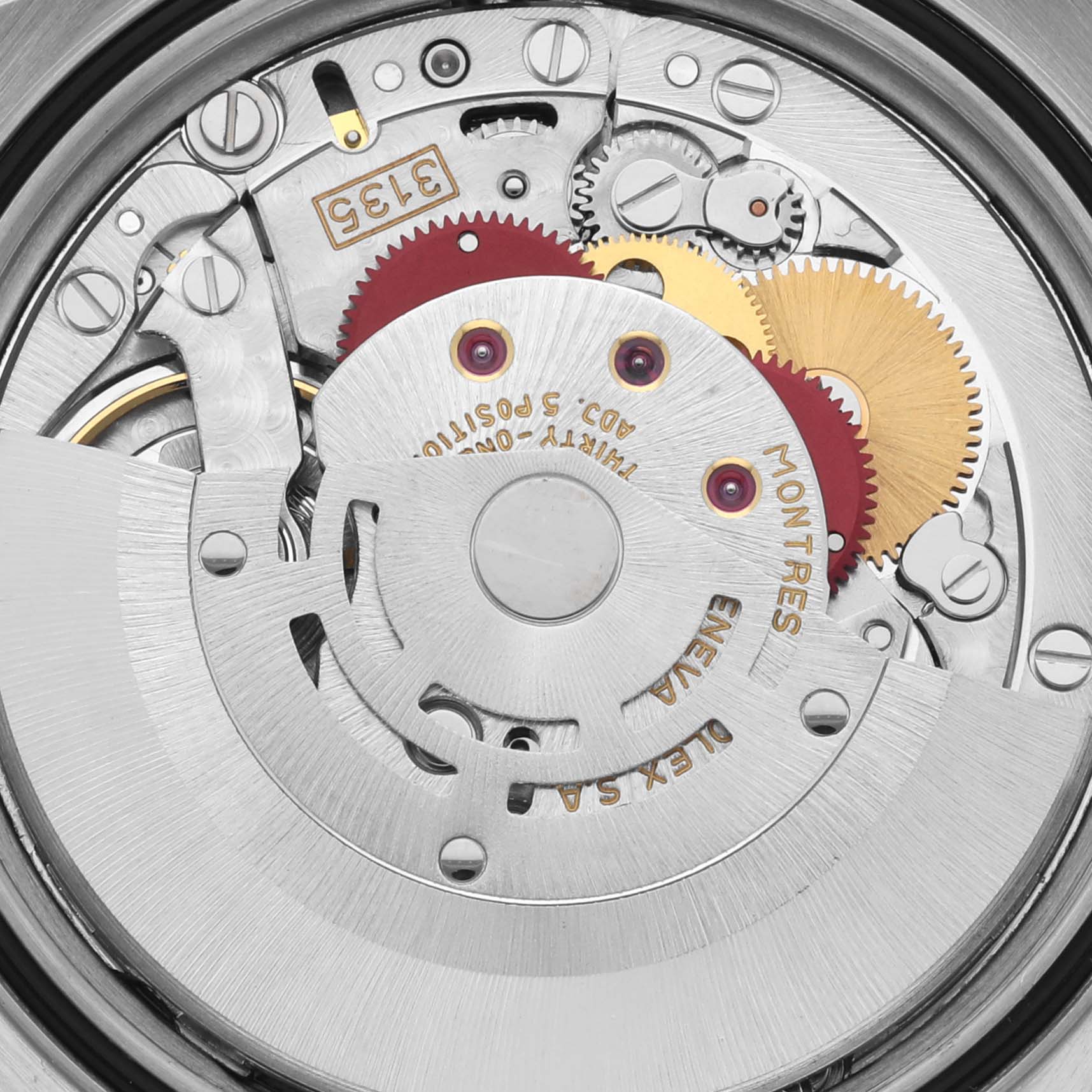 The image shows the intricate inner mechanism of a Rolex Datejust 16233 Men's Steel and Gold (two tone) White Dial 16233 Men's Steel and Gold (two tone) White Dial, highlighting gears and components at a top-down angle.