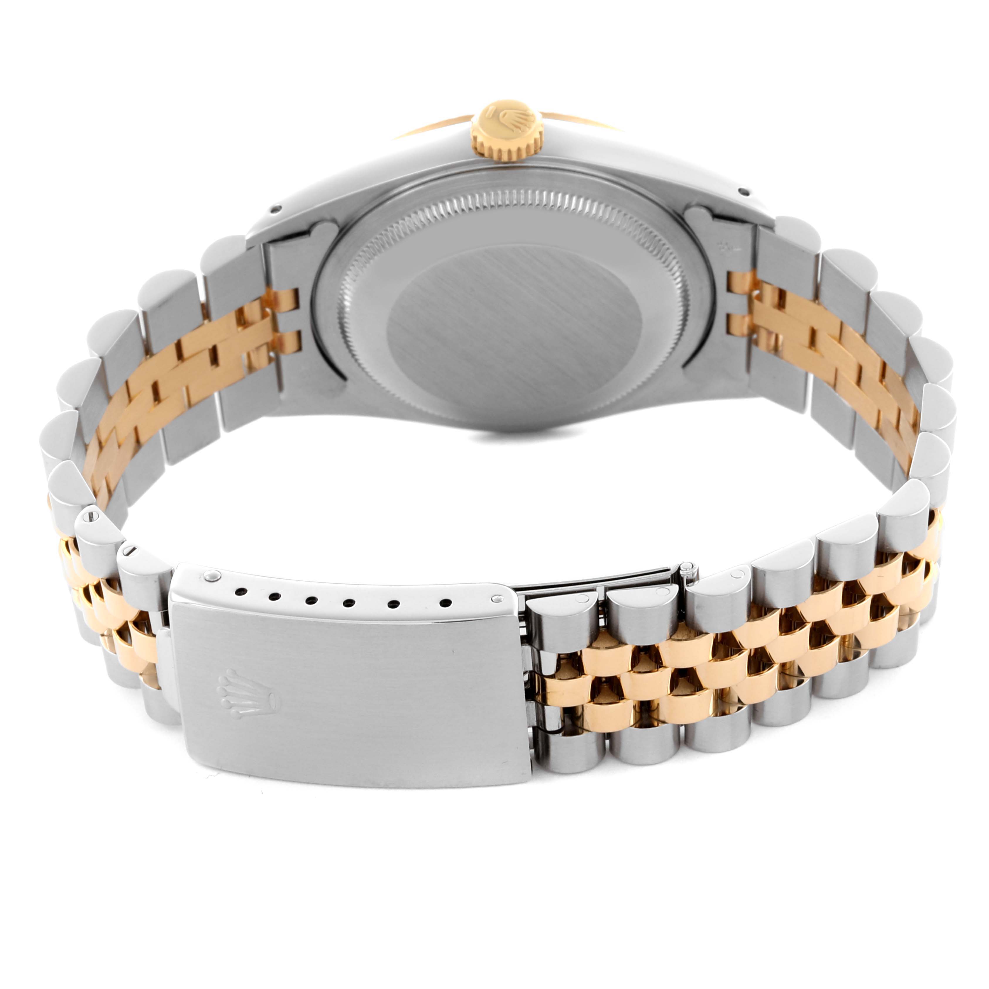 The image shows the back of the Rolex Datejust 16233 Men's Steel and Gold (two tone) White Dial 16233 Men's Steel and Gold (two tone) White Dial, focusing on the case, crown, and two-tone Jubilee bracelet with the clasp.
