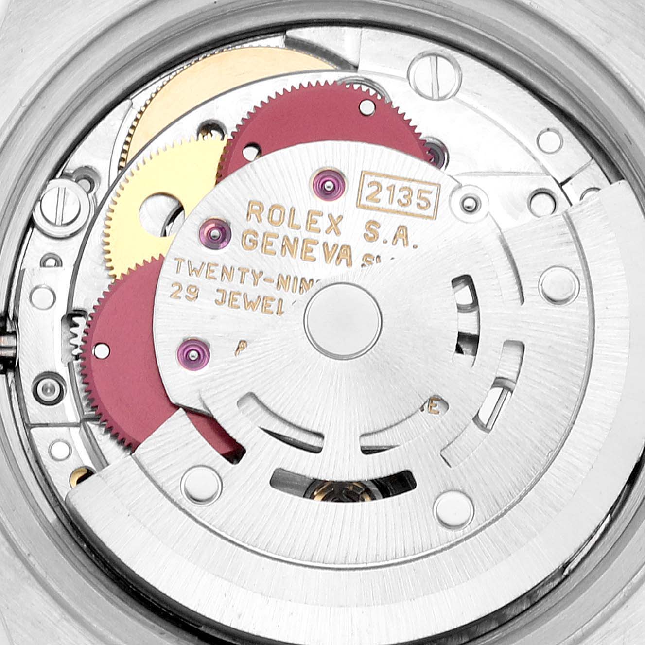 The image shows the intricate inner mechanism of the Rolex Datejust 69173 Women's Steel and Gold (two tone) White Dial 69173 Women's Steel and Gold (two tone) White Dial model, highlighting gears and the rotor.