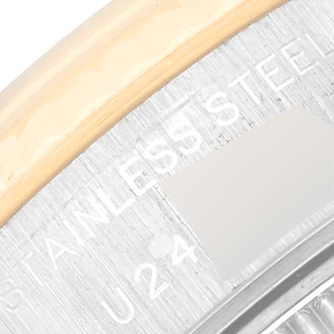 Close-up angle of the side view showing the writing, and part of the bezel of the Rolex Datejust 69173 Women's Steel and Gold (two tone) White Dial 69173 Women's Steel and Gold (two tone) White Dial watch.