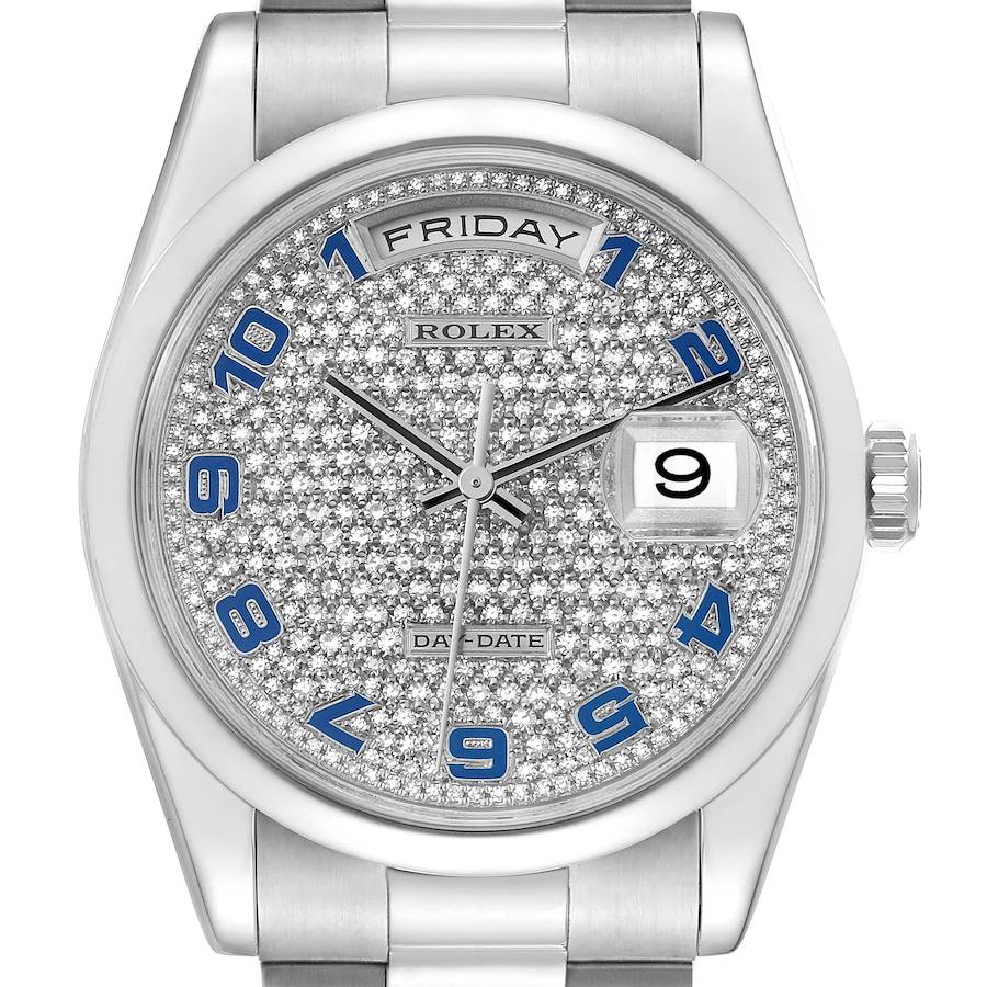 The Rolex President watch is shown from a front angle, highlighting the diamond-studded dial and day-date features.