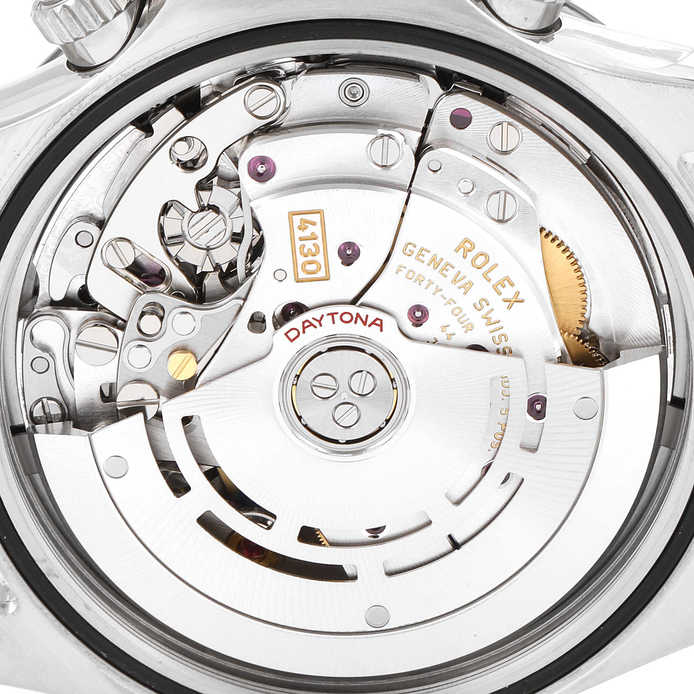 This image shows the internal movement mechanism of the Rolex Daytona 116500 Men's Stainless Steel White Dial 116500 Men's Stainless Steel White Dial watch, featuring gears, jewels, and the rotor.