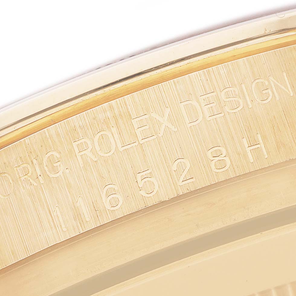 The image shows the side engraving on the metal case of a Rolex Daytona 116528 Men's Yellow Gold Mother of Pearl Dial, highlighting its model design and serial number.