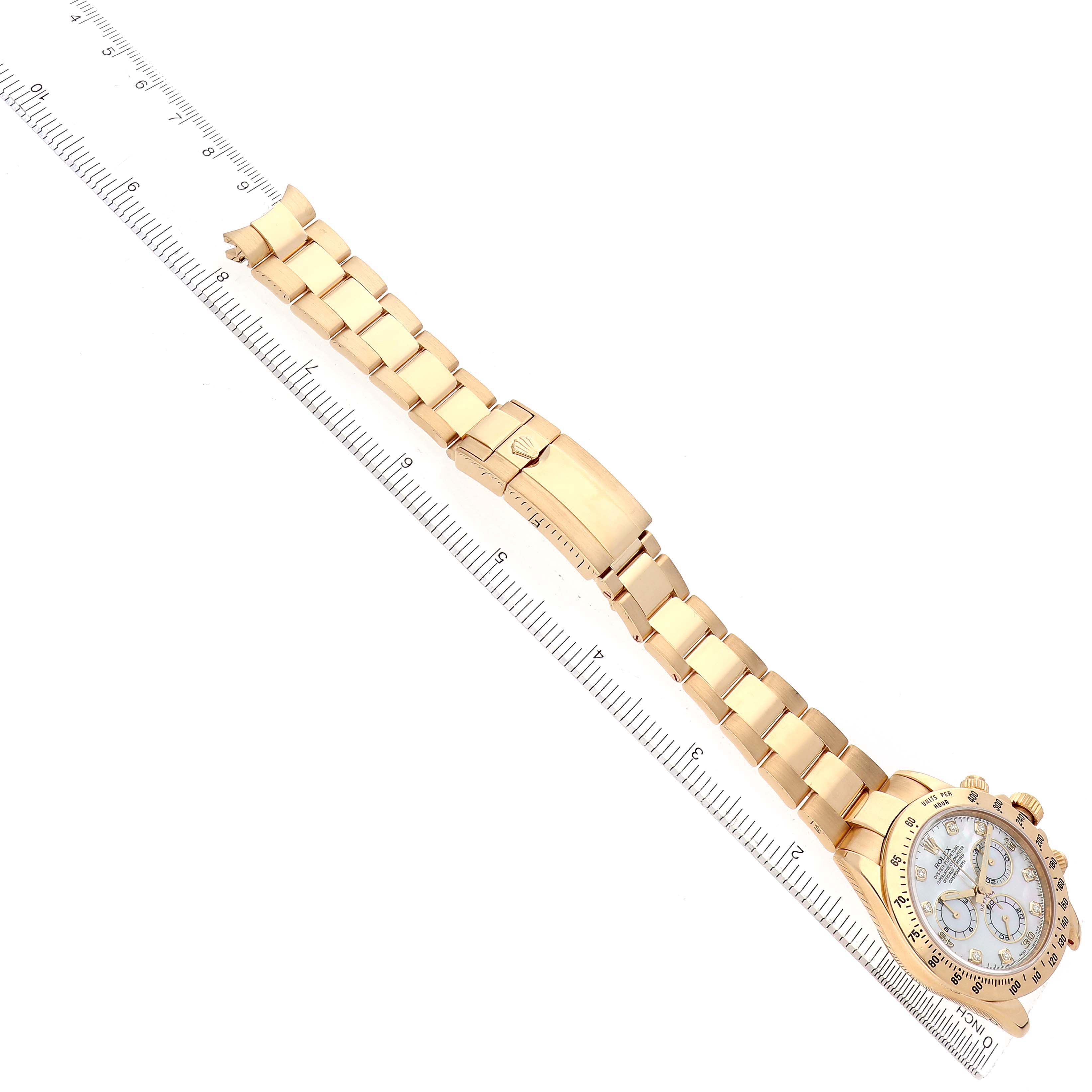 The Rolex Daytona 116528 Men's Yellow Gold Mother of Pearl Dial watch is shown from a top-down angle, highlighting the dial, bracelet, and clasp.