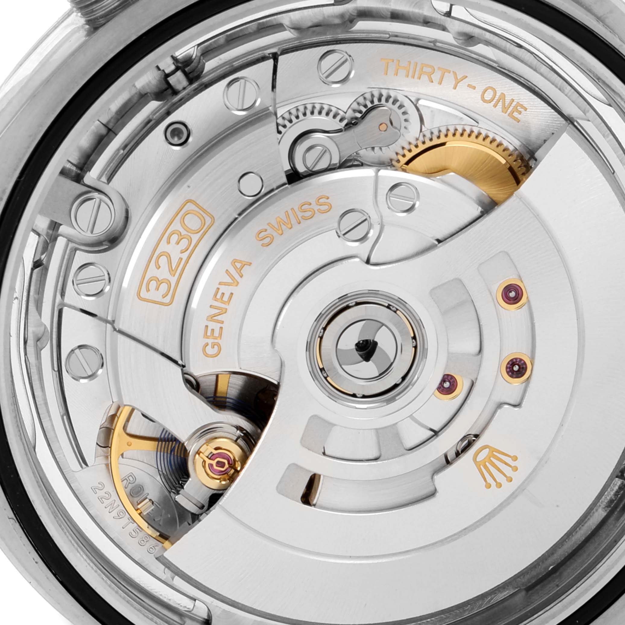 The image shows a close-up of the movement mechanism of the Rolex Oyster Perpetual 124300 Men
s Stainless Steel Silver Dial 124300 Men
s Stainless Steel Silver Dial, highlighting its intricate parts and engravings.