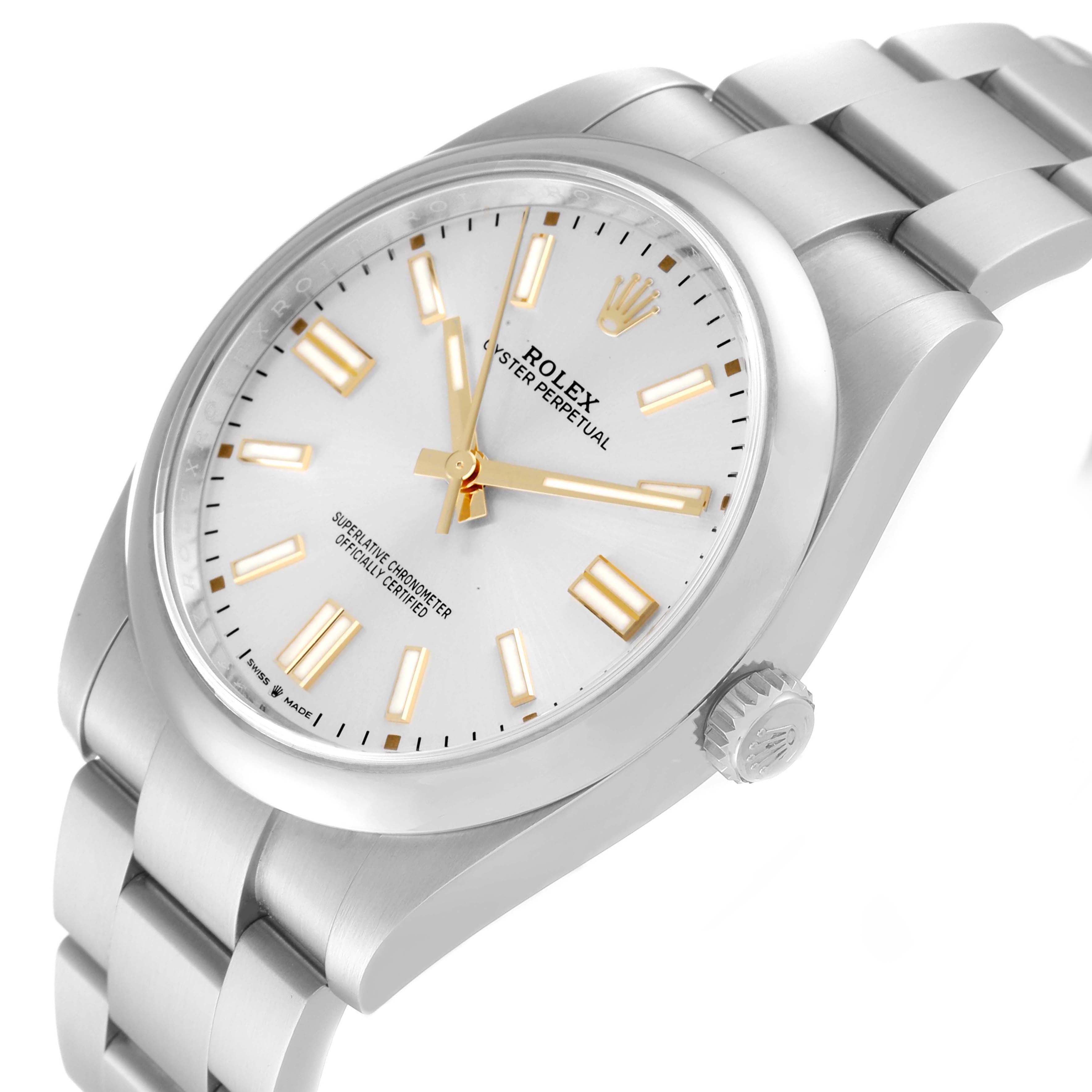 The image shows a close-up angle of the Rolex Oyster Perpetual 124300 Men
s Stainless Steel Silver Dial 124300 Men
s Stainless Steel Silver Dial watch, focusing on the dial, crown, and part of the bracelet.