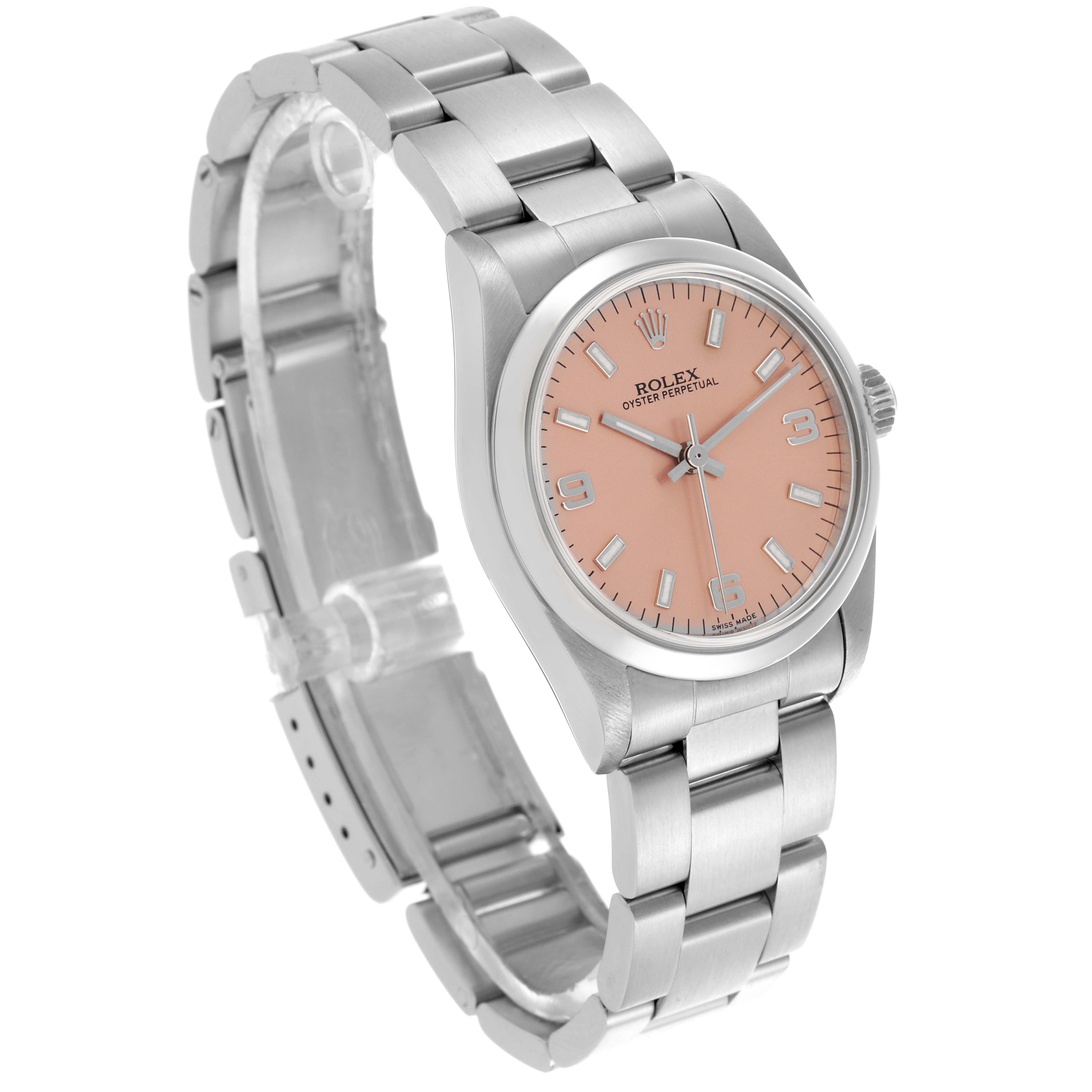 The Rolex Oyster Perpetual Mid-Size is shown at an angled view, highlighting the face, bezel, and bracelet.