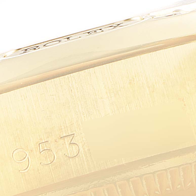 This image shows a close-up of the case back and serial number engraving on a Rolex President 69158 Women
s Yellow Gold Champagne Dial 69158 Women
s Yellow Gold Champagne Dial watch.