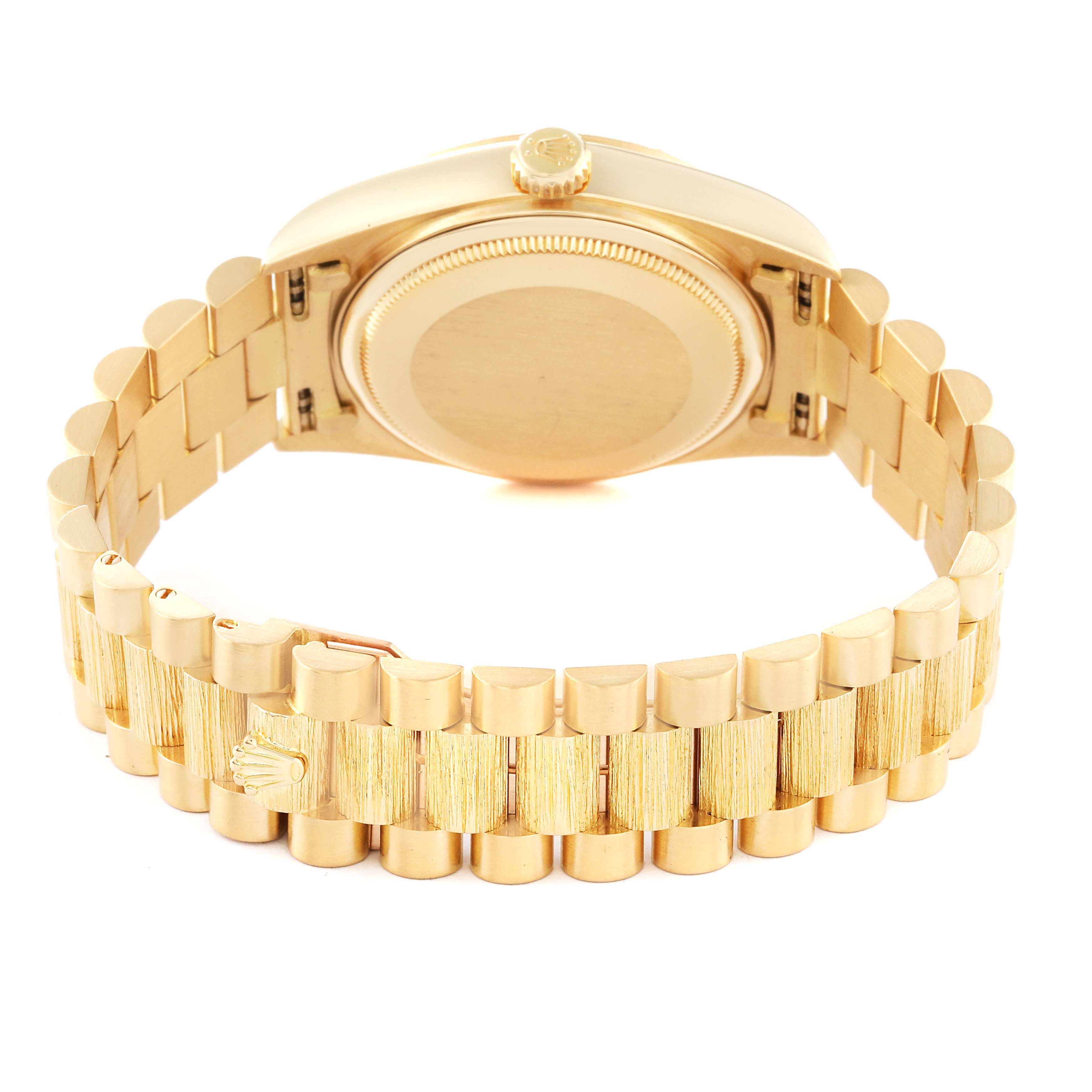 This is a rear view of a Rolex President 18078 Men
s Yellow Gold Champagne Dial 18078 Men
s Yellow Gold Champagne Dial model watch, showcasing the case back and the gold bracelet with the Rolex logo.