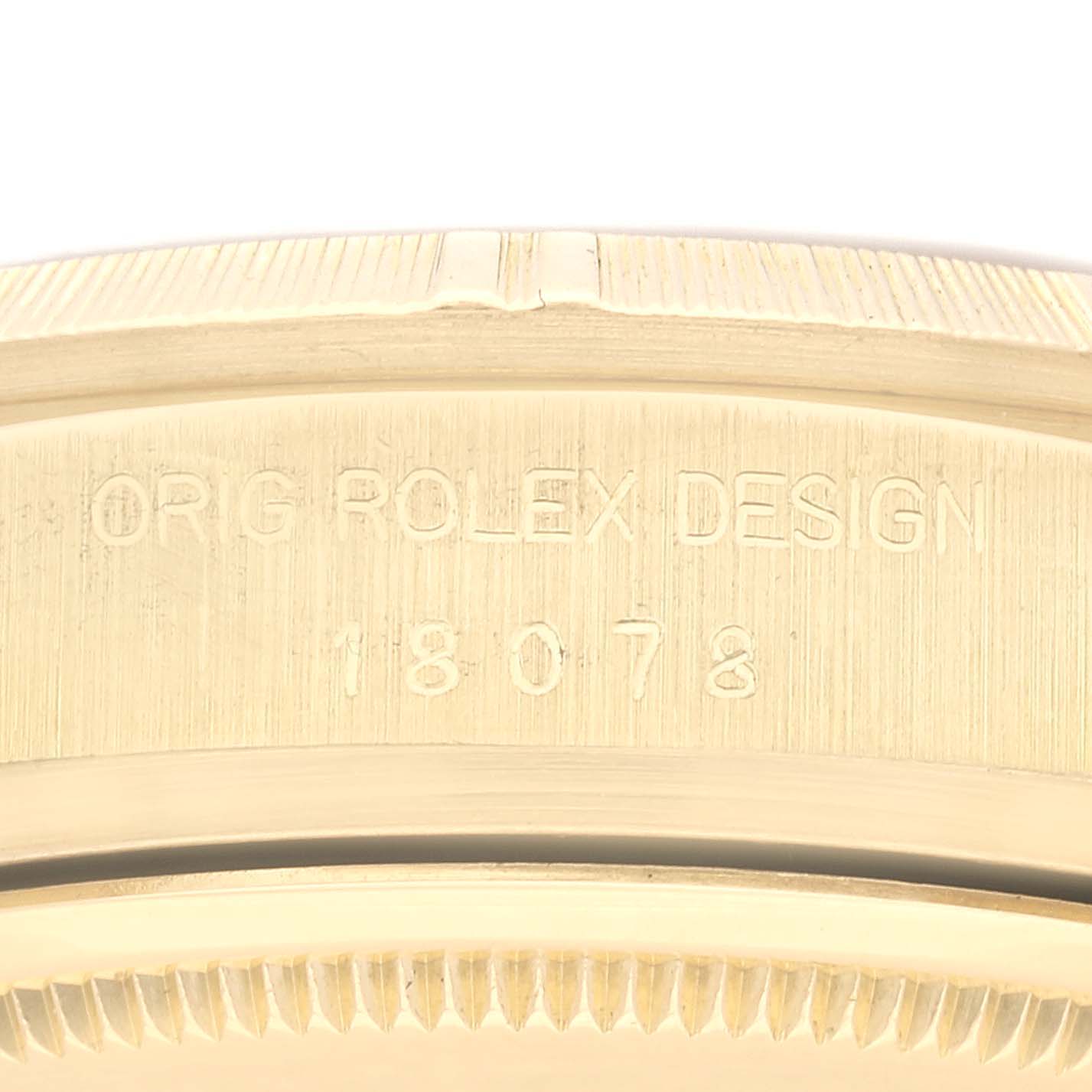 The image shows a close-up angle of the model number and design inscription on the edge of a Rolex President 18078 Men
s Yellow Gold Champagne Dial 18078 Men
s Yellow Gold Champagne Dial 18078 watch.