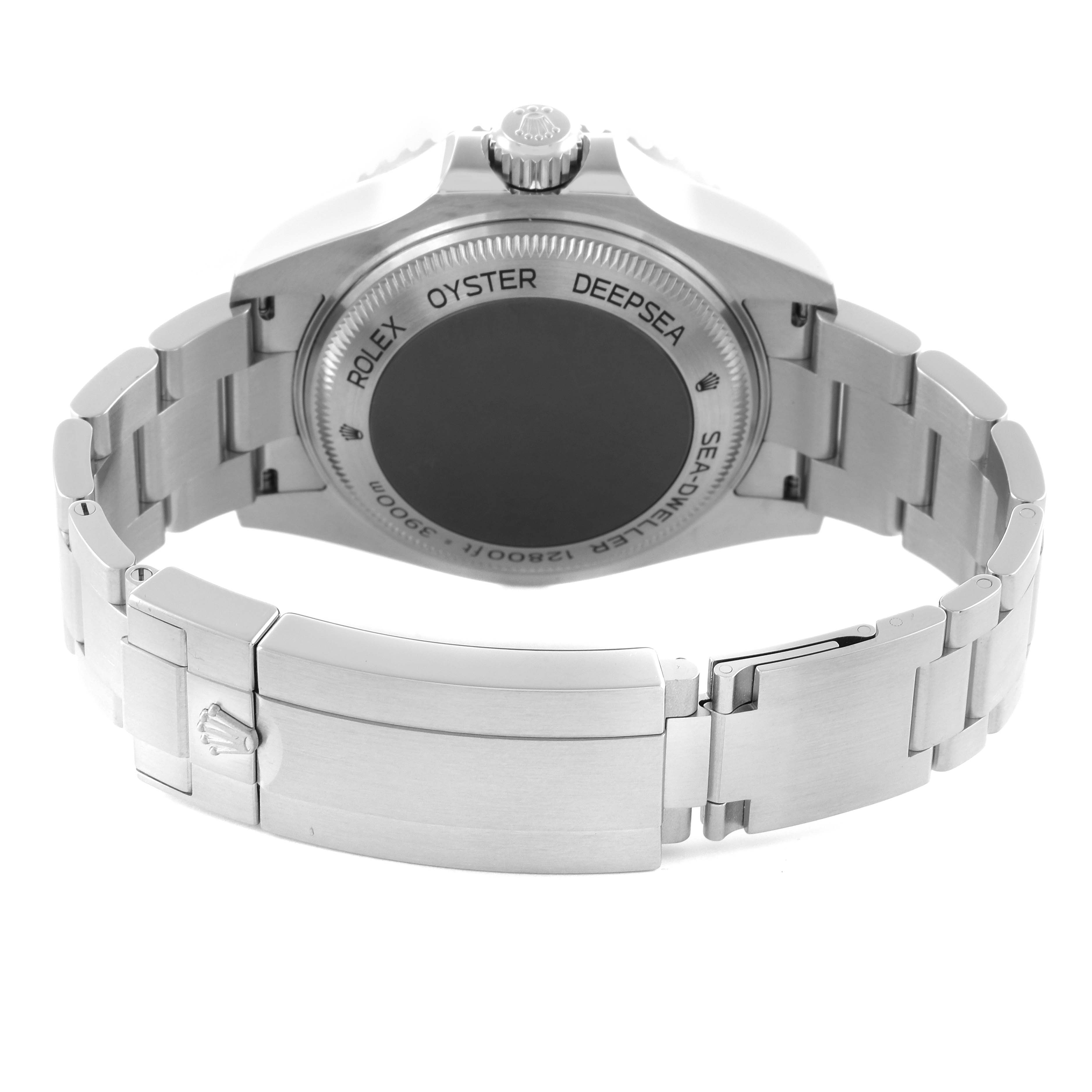 The image shows the Rolex Sea-Dweller 126660 Men
s Stainless Steel Blue Dial 126660 Men
s Stainless Steel Blue Dial watch from the back, highlighting the case back, bracelet, and clasp.