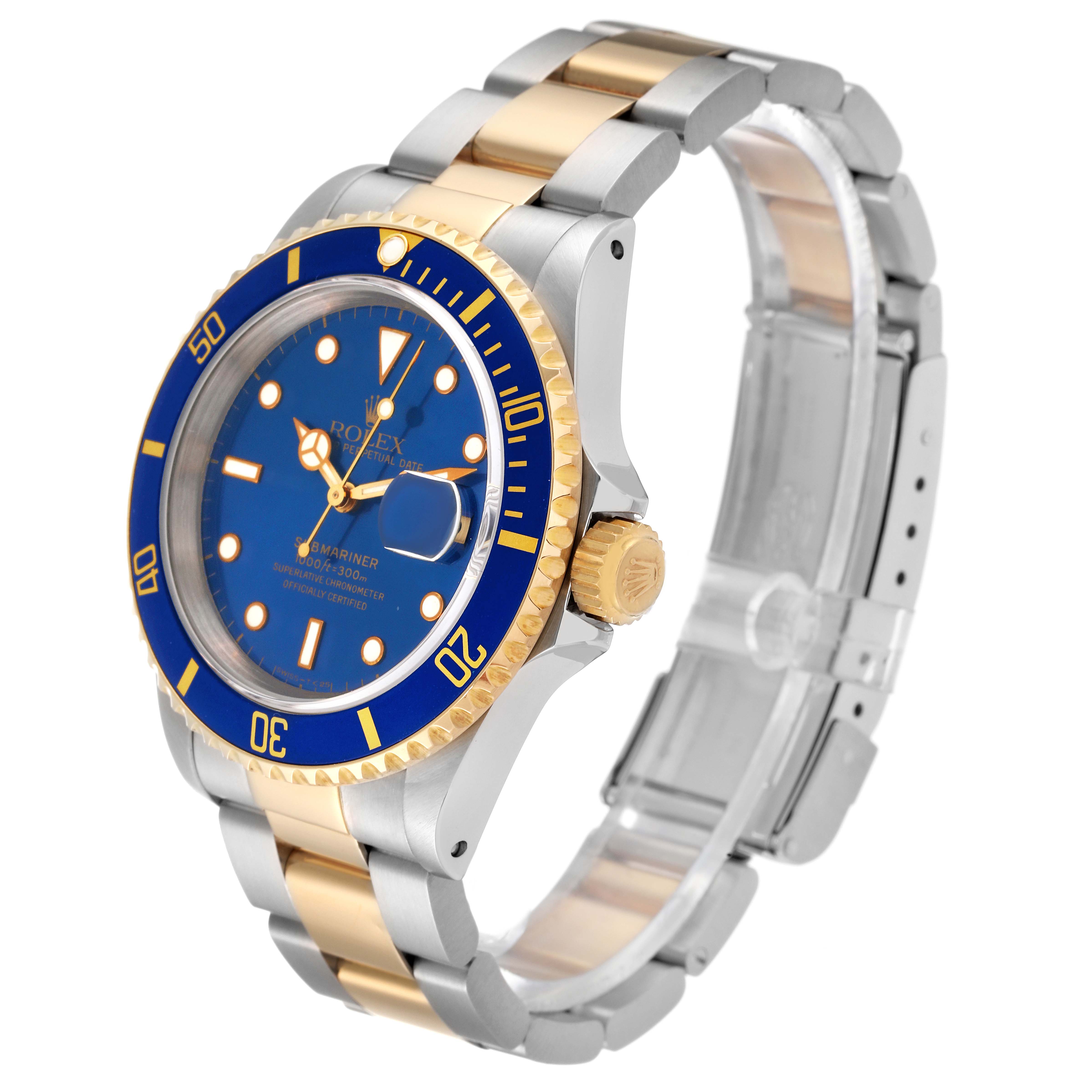 The image shows a Rolex Submariner 16613 Men
s Steel and Gold (two tone) Blue Dial 16613 Men
s Steel and Gold (two tone) Blue Dial watch at a three-quarter angle, highlighting the bezel, dial, and bracelet.