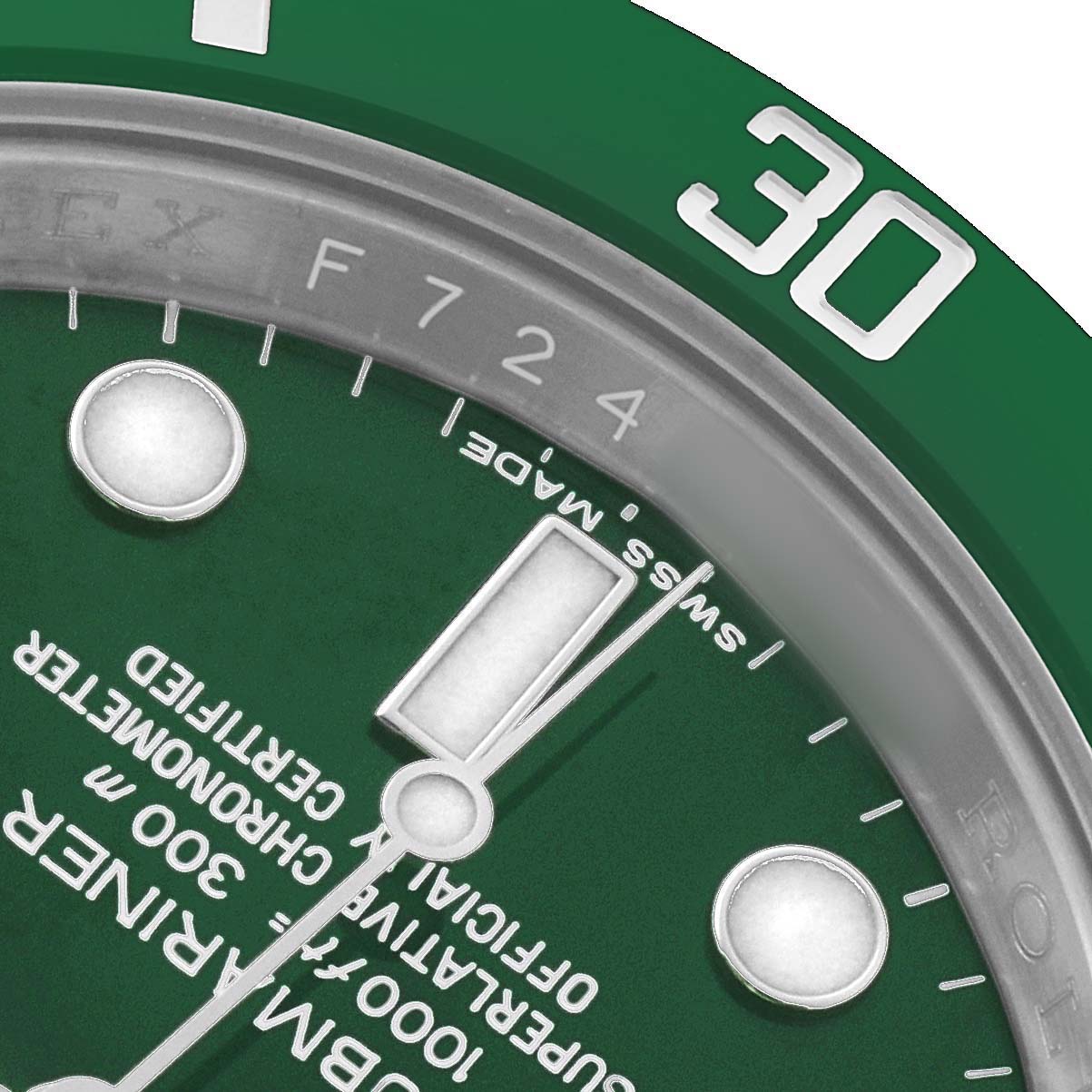 The image shows a close-up of the Rolex Submariner 116610LV Men's Stainless Steel Green Dial's green dial, focusing on the bezel, markers, and part of the text.