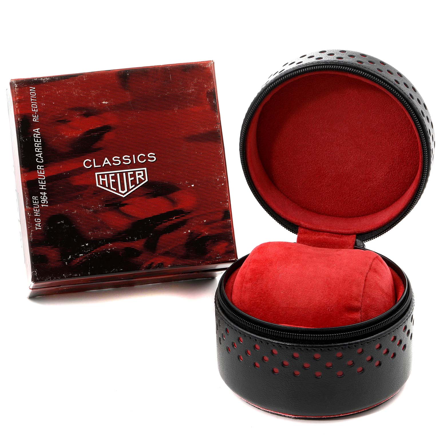 The image shows a red and black Tag Heuer Carrera CS3110 Men's Stainless Steel Silver Dial CS3110 Men's Stainless Steel Silver Dial watch box and a matching round carrying case with a pillow for the watch.