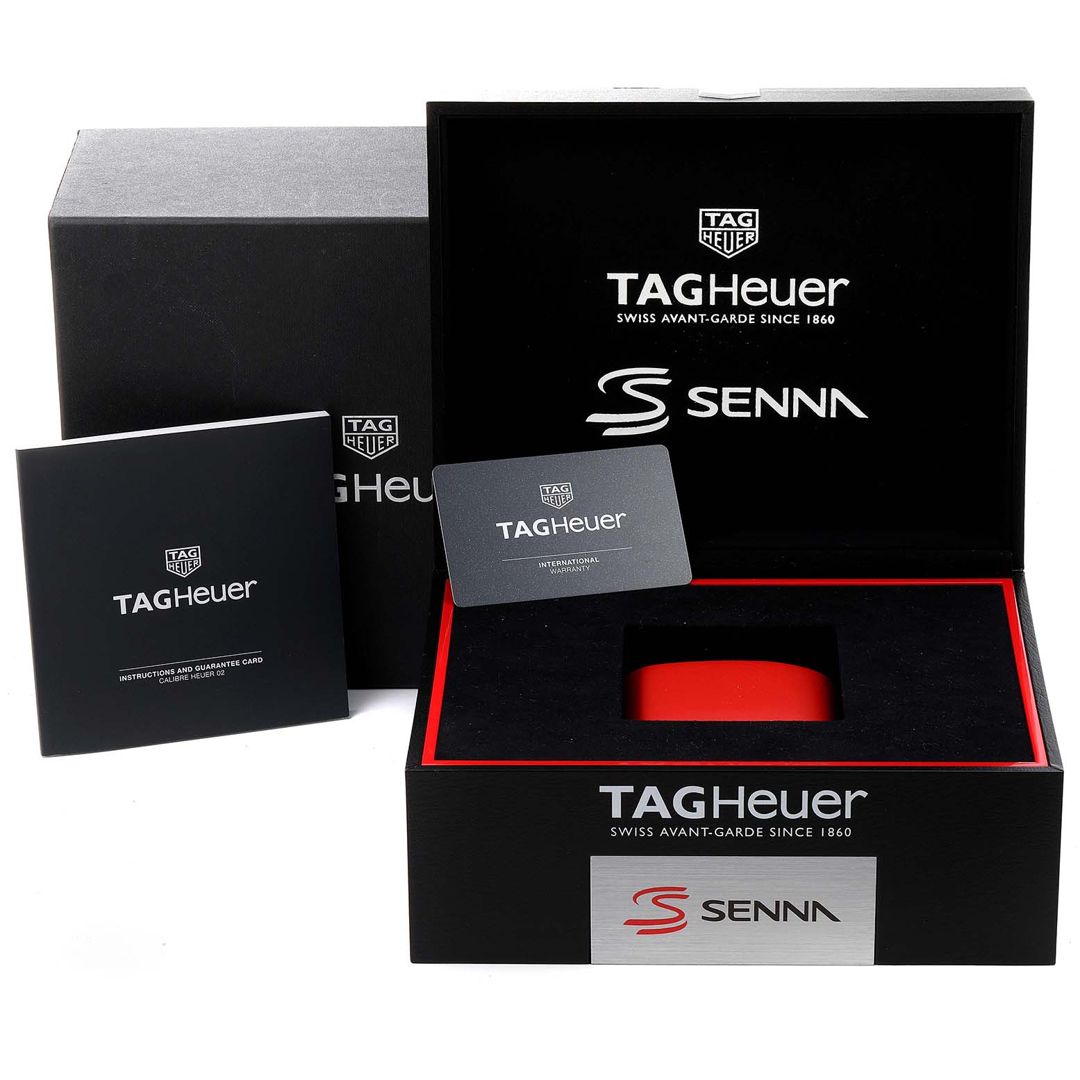 The image shows the box, instruction manual, and guarantee card for a Tag Heuer Carrera CBG2013.BA0657 Men's Stainless Steel Transparent Dial CBG2013.BA0657 Men's Stainless Steel Transparent Dial Senna watch.