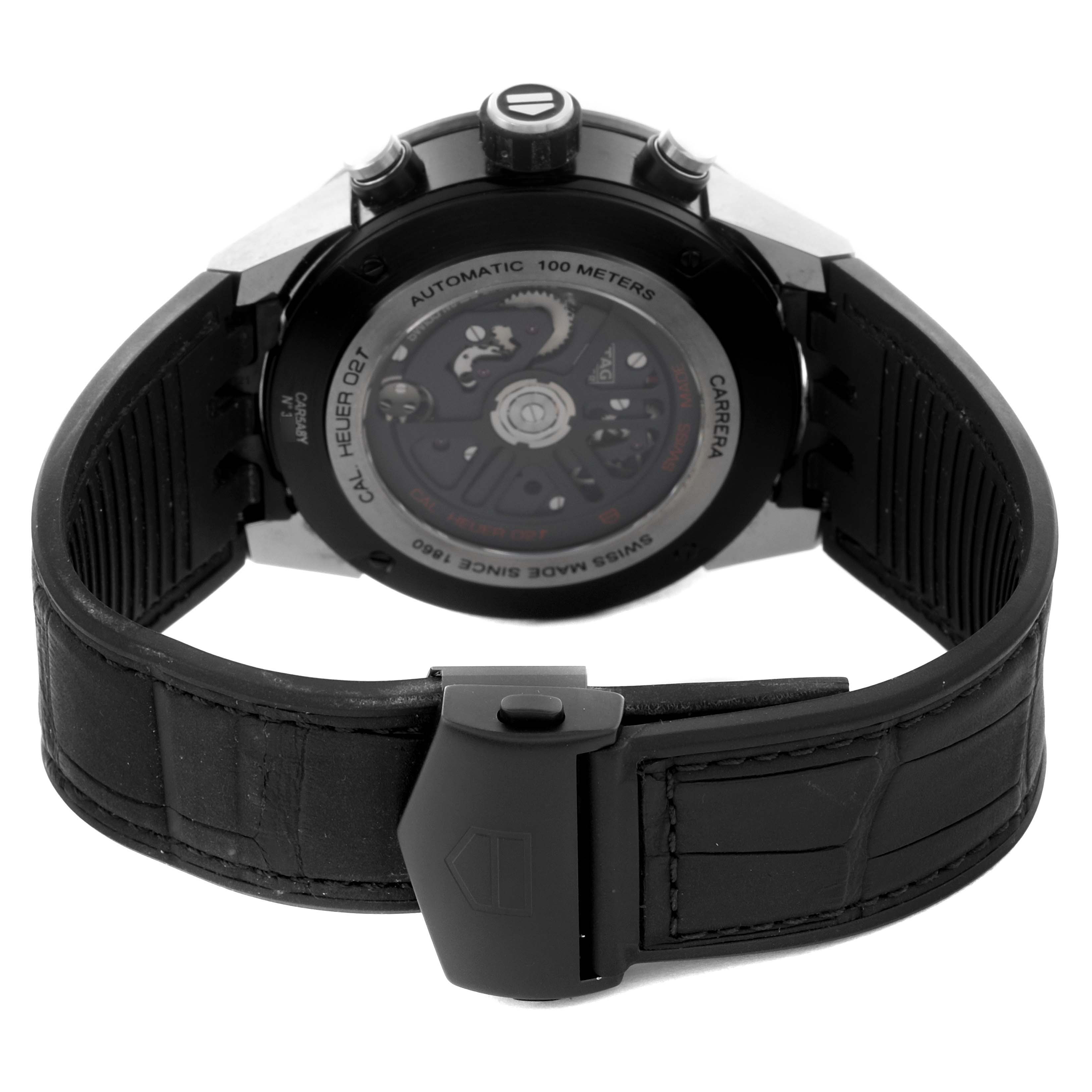 The Tag Heuer Carrera CAR5A8Y.FC6377 Men's Titanium Transparent Dial CAR5A8Y.FC6377 Men's Titanium Transparent Dial watch is shown from the back, highlighting the automatic movement and strap clasp.