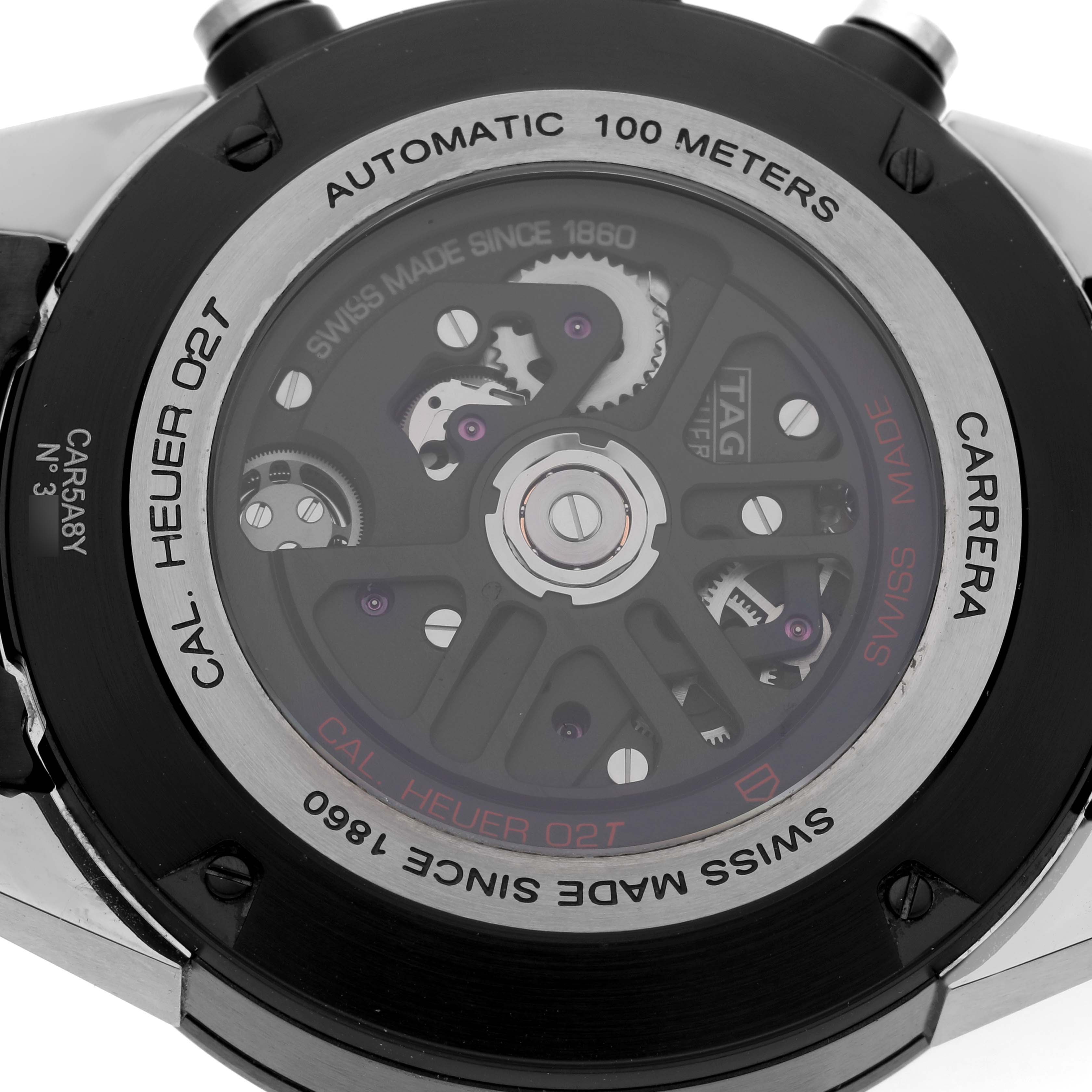 The image shows the back view of the Tag Heuer Carrera CAR5A8Y.FC6377 Men's Titanium Transparent Dial CAR5A8Y.FC6377 Men's Titanium Transparent Dial, highlighting its movement and engravings on the case.