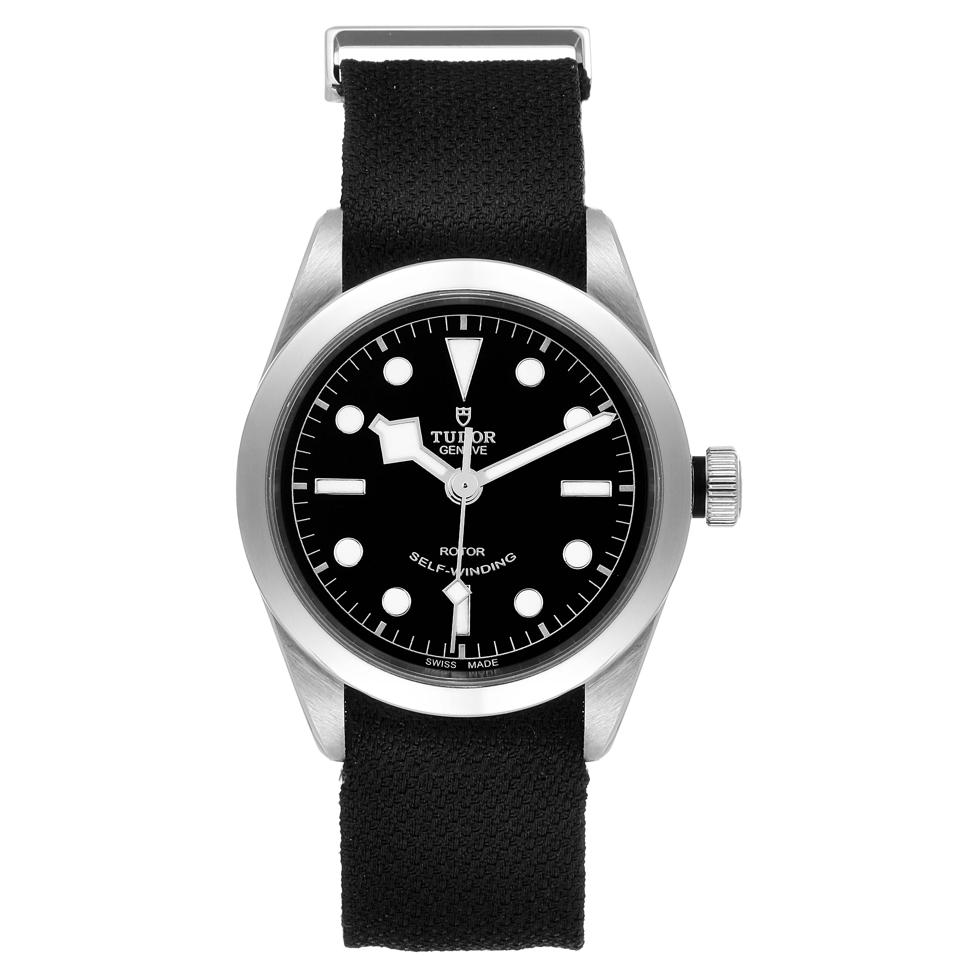 This Tudor Heritage Black Bay 79500 Men
s Stainless Steel Black Dial 79500 Men
s Stainless Steel Black Dial watch is shown from a top-down angle, displaying its black dial, luminous markers, and nylon strap.