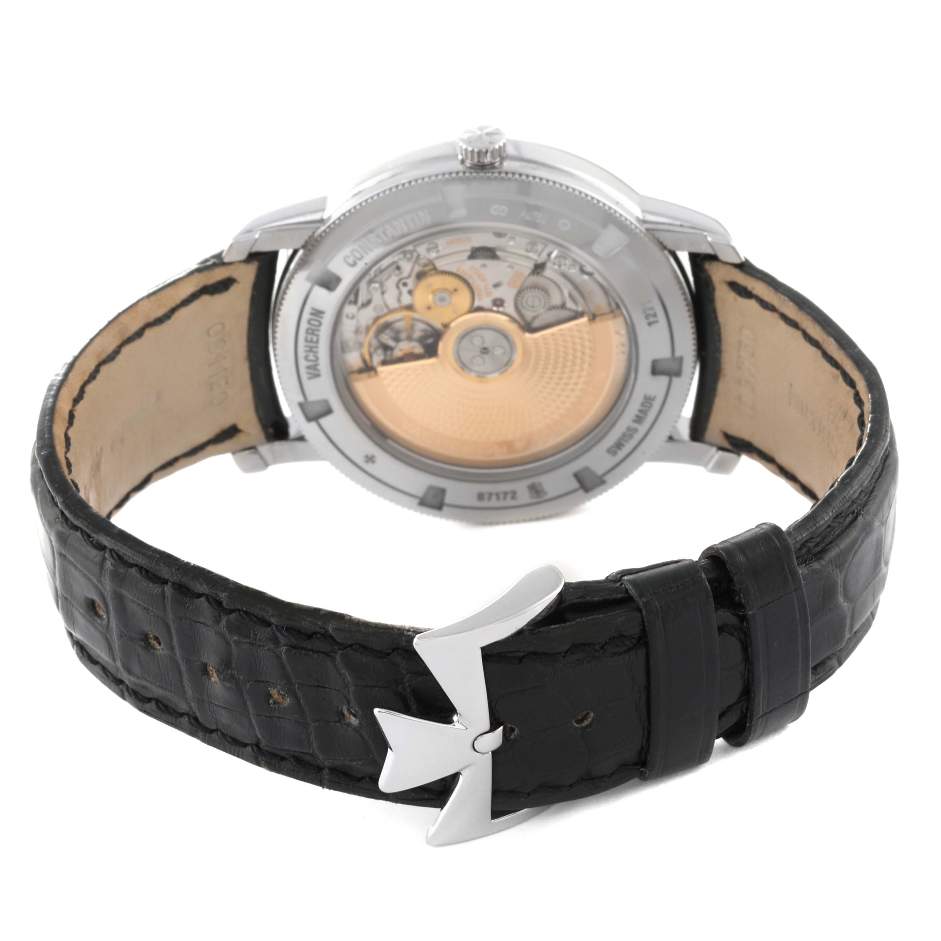 The image shows the back view of a Vacheron Constantin Traditionnelle 87172/000G-9301 Men's White Gold Silver Dial 87172/000G-9301 Men's White Gold Silver Dial watch, highlighting its mechanical interior and black strap.