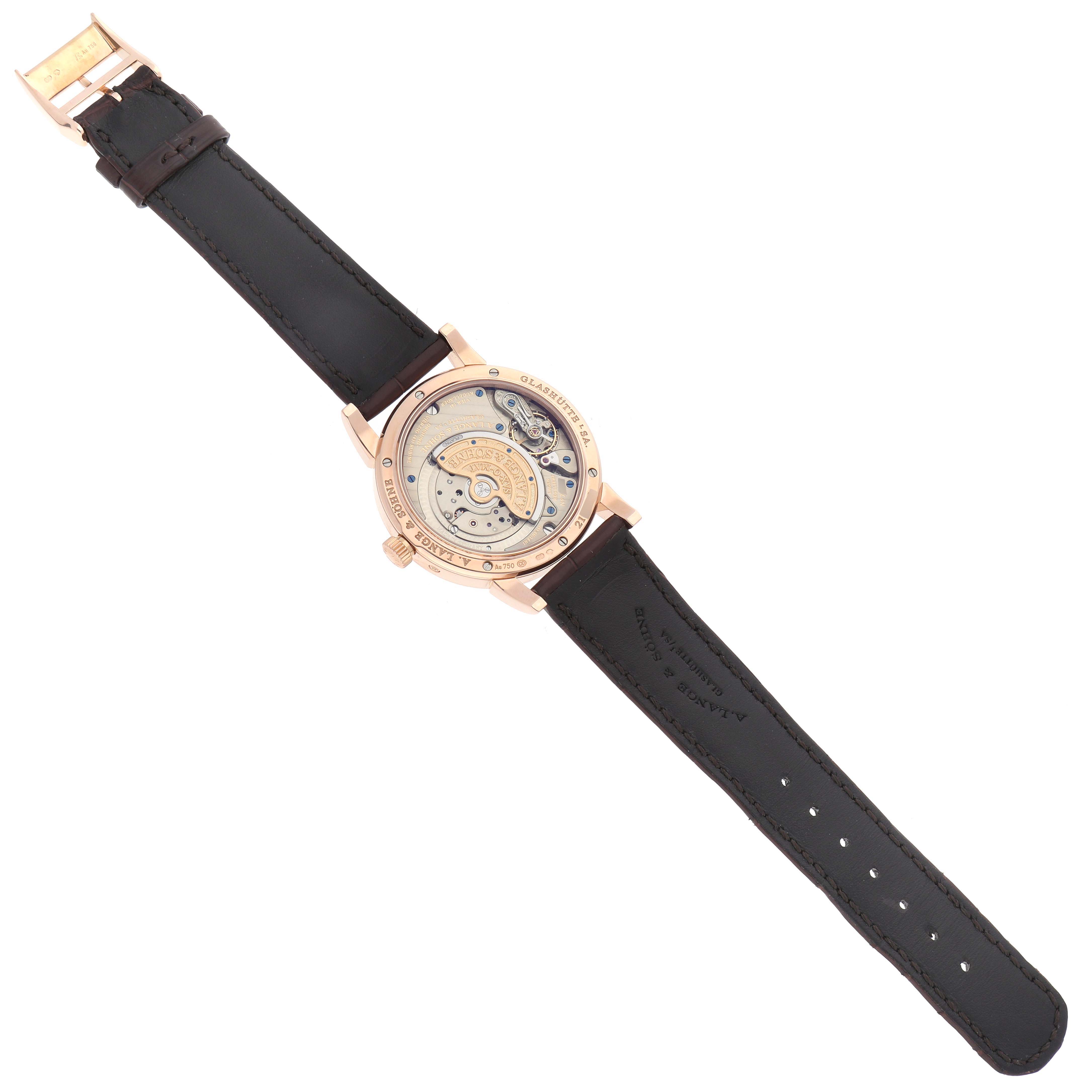 The image shows the back of the Richard Lange watch by A. Lange & Söhne, highlighting its movement and leather strap.