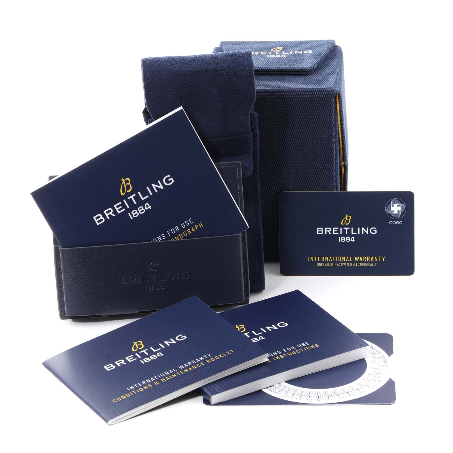 The image shows accessories for a Breitling Navitimer A13324 Men
s Stainless Steel Black Dial A13324 Men
s Stainless Steel Black Dial, including manuals, warranty cards, a case, and a protective sleeve.