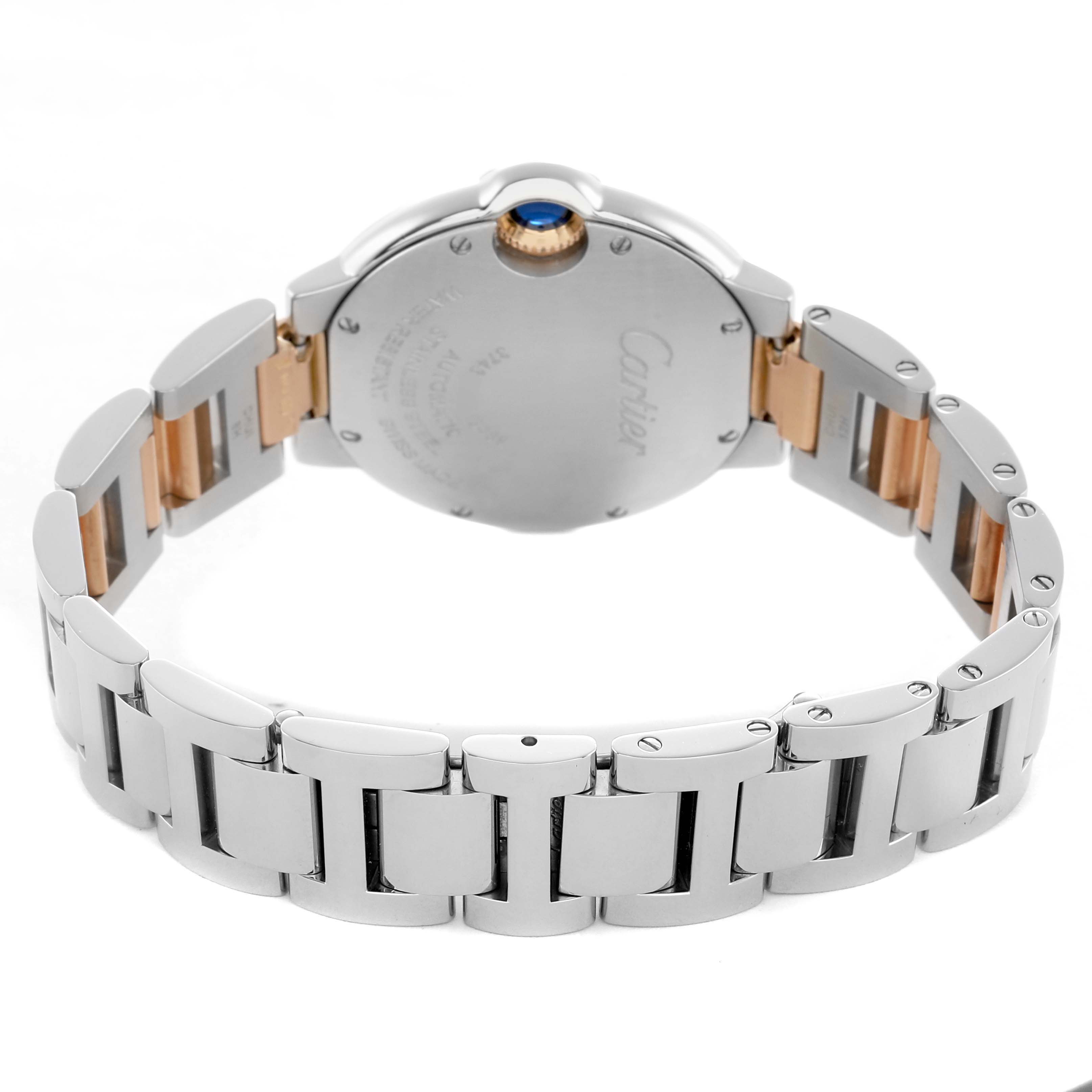 The image shows the back and side of a Cartier Ballon Bleu WE902053 Women's Stainless Steel Pink Dial watch, highlighting its metal bracelet and crown.